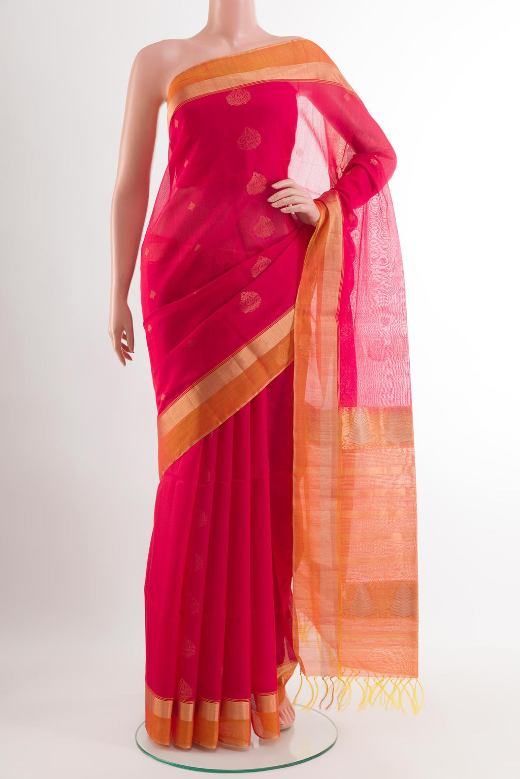 Dark Pink Kora Cotton Saree with Zari Butta on the body and Zari Border.  displayed on a mannequin