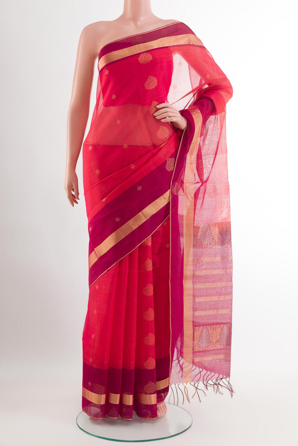 Dark Pink Blended Kora Cotton Saree with Zari Butta on the body and Zari Border.  displayed on a mannequin