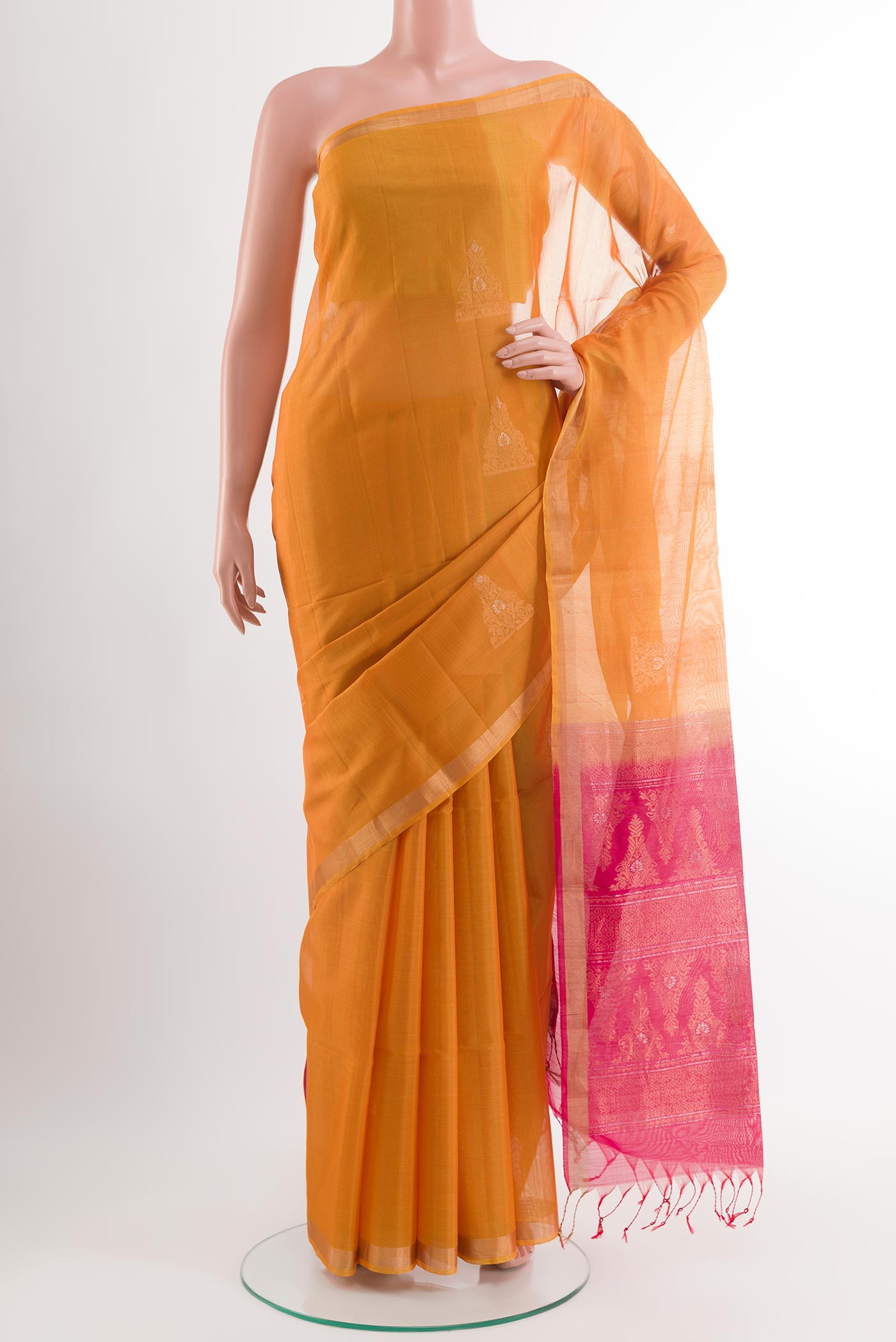 Yellow Blended Kora Cotton Saree with Zari Butta on the body and Zari Border.  displayed on a mannequin