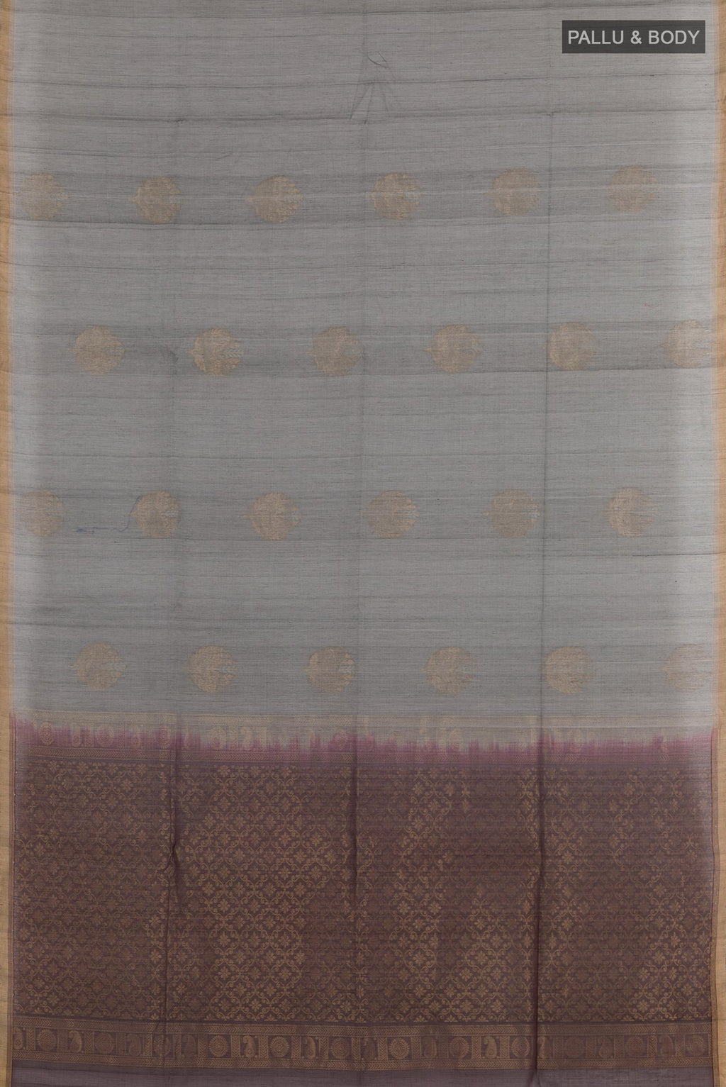 Flat view of Grey Blended Kora Cotton Saree with Zari Butta on the body and Zari Border. 