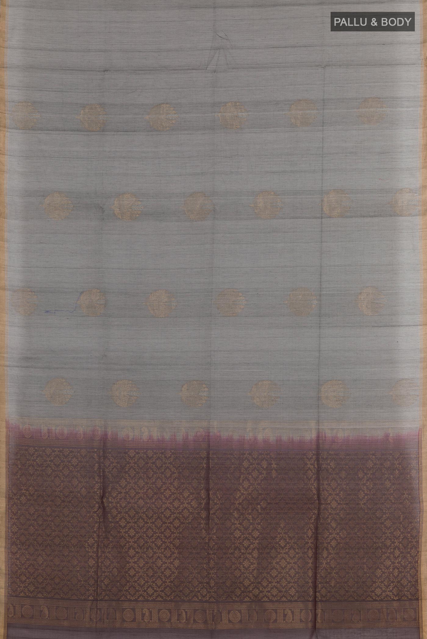 Flat view of Grey Blended Kora Cotton Saree with Zari Butta on the body and Zari Border. 