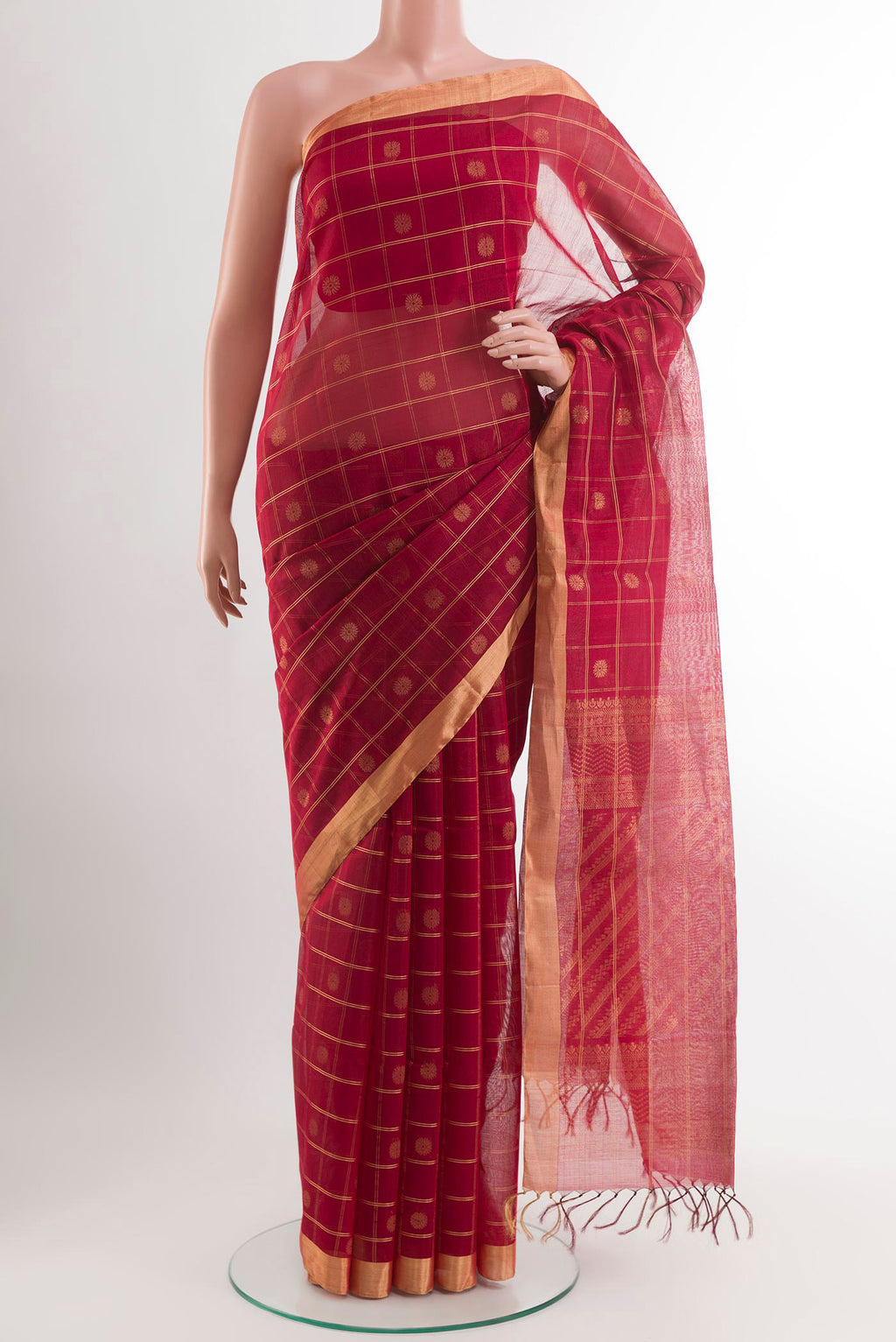 Red Blended Kora Cotton Saree with Zari Butta on the body and Zari Border.  displayed on a mannequin