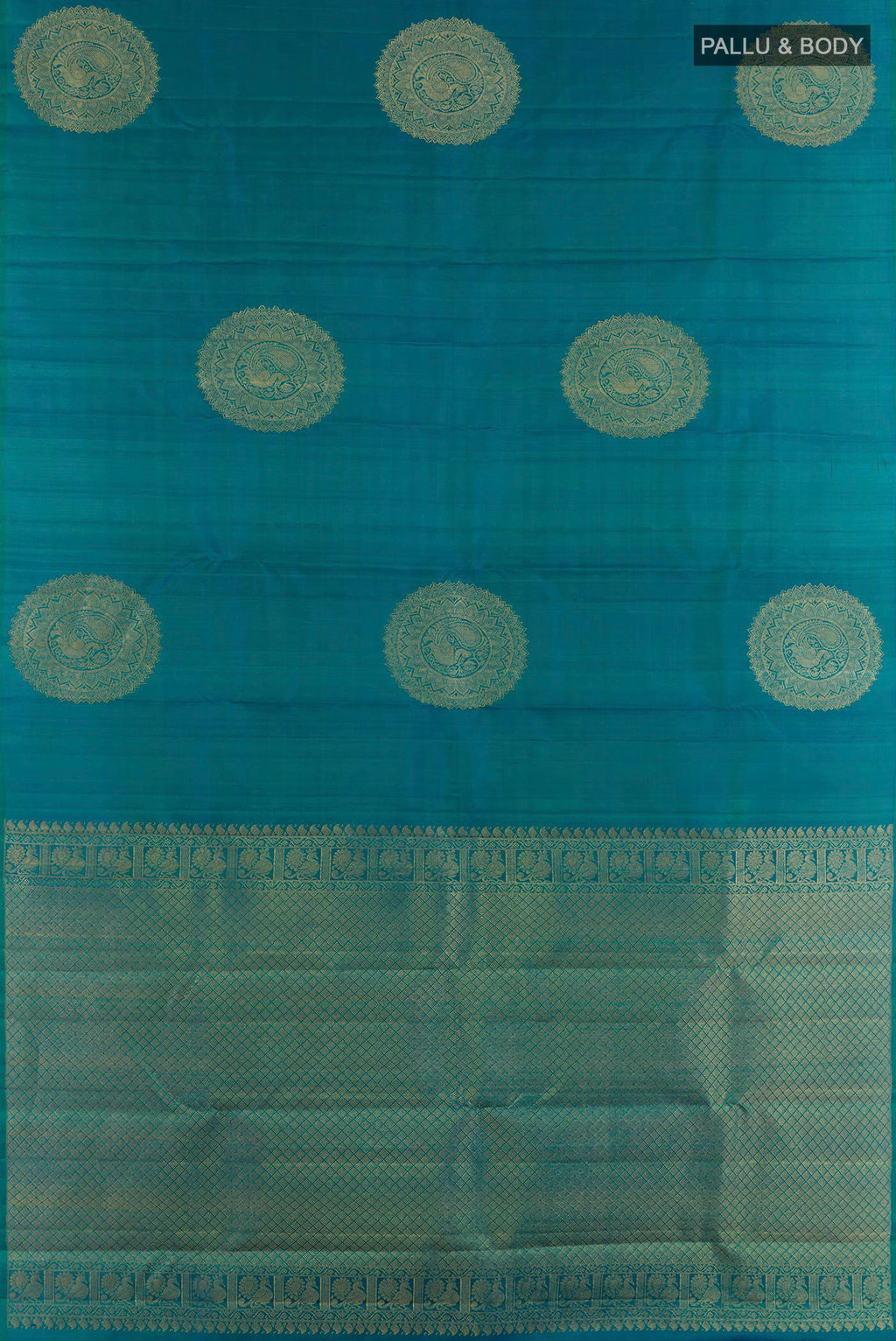 Flat view of Peacock Blue Kanchipuram Silk Saree with Zari Butta on the body and Zari Border. 