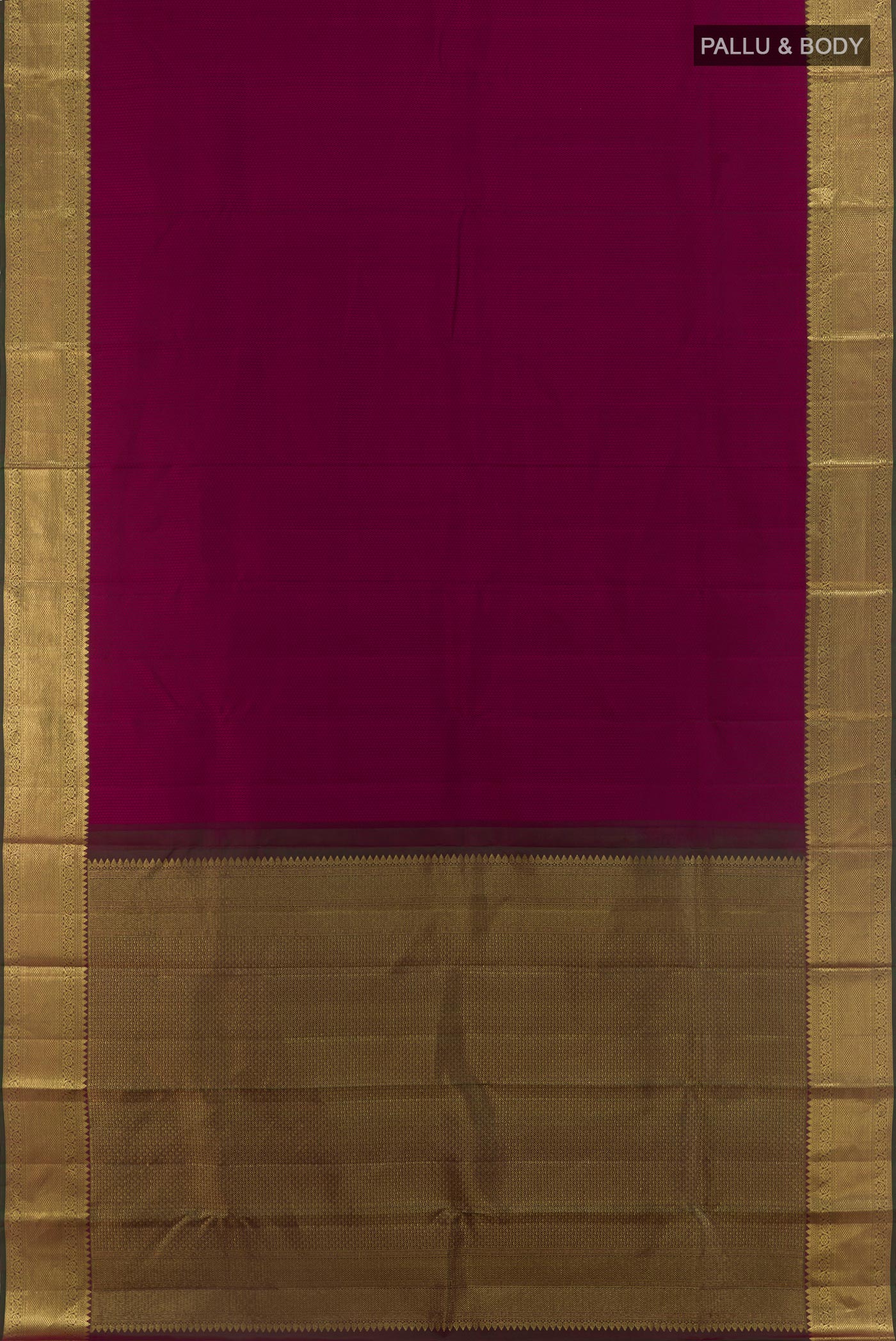 Flat view of Magenta Kanjivaram Silk Saree with Jacquard design on the body and Zari Border. 