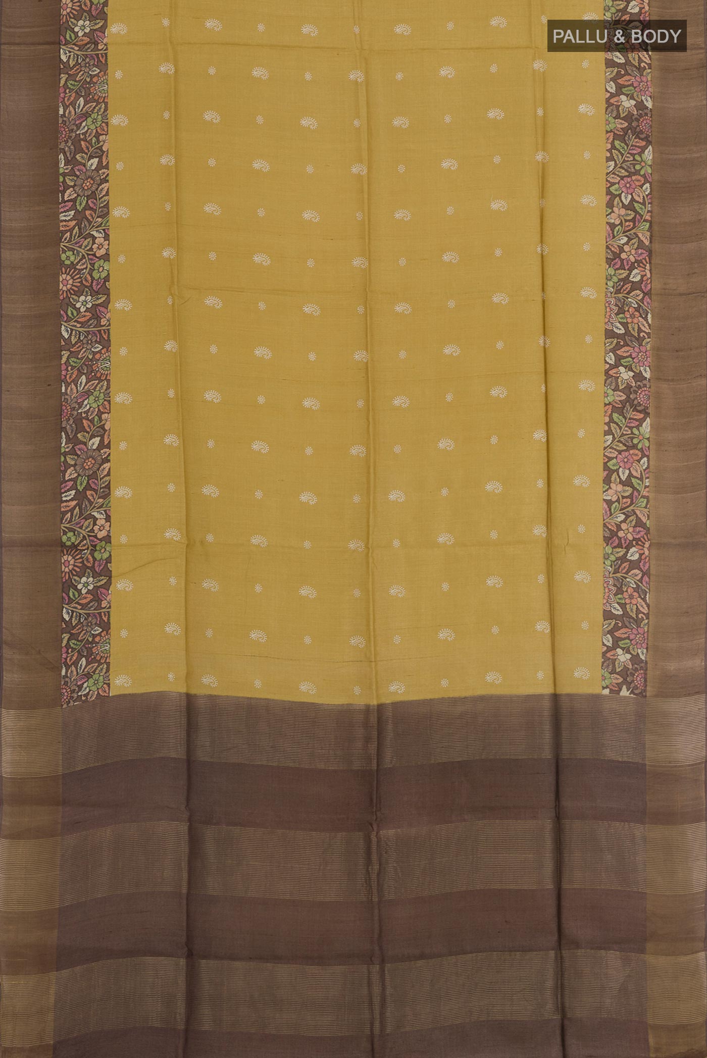 Flat view of Mustard Tussar Saree with Thread Butta on the body and Zari Border. 
