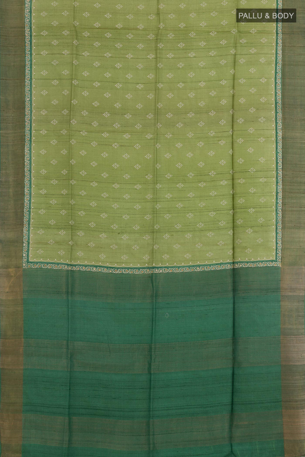 Flat view of Green Tussar Saree with Thread Butta on the body and Zari Border. 