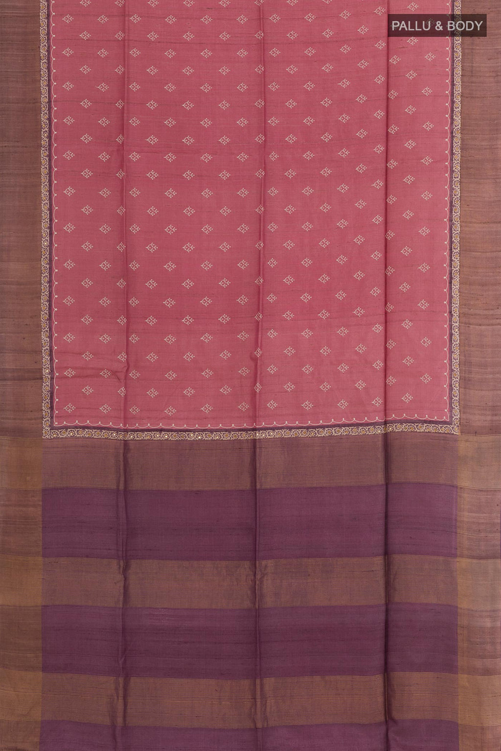 Flat view of Light Magenta Tussar Saree with Thread Butta on the body and Zari Border. 