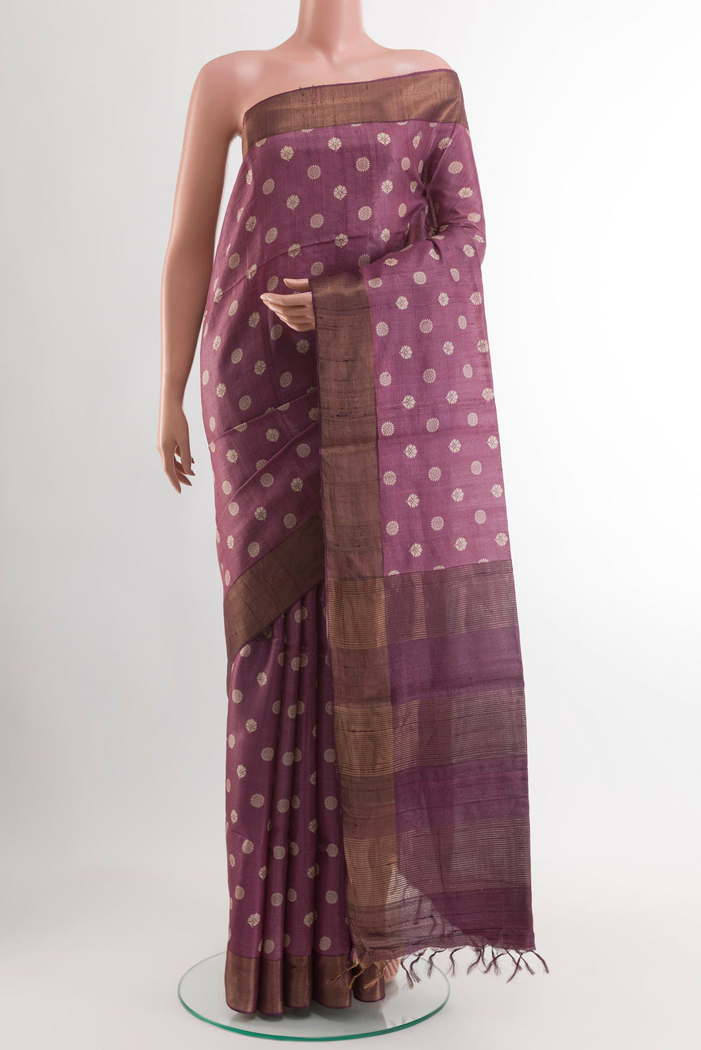 Purple Tussar Saree with Printed design on the body and Zari Border.  displayed on a mannequin