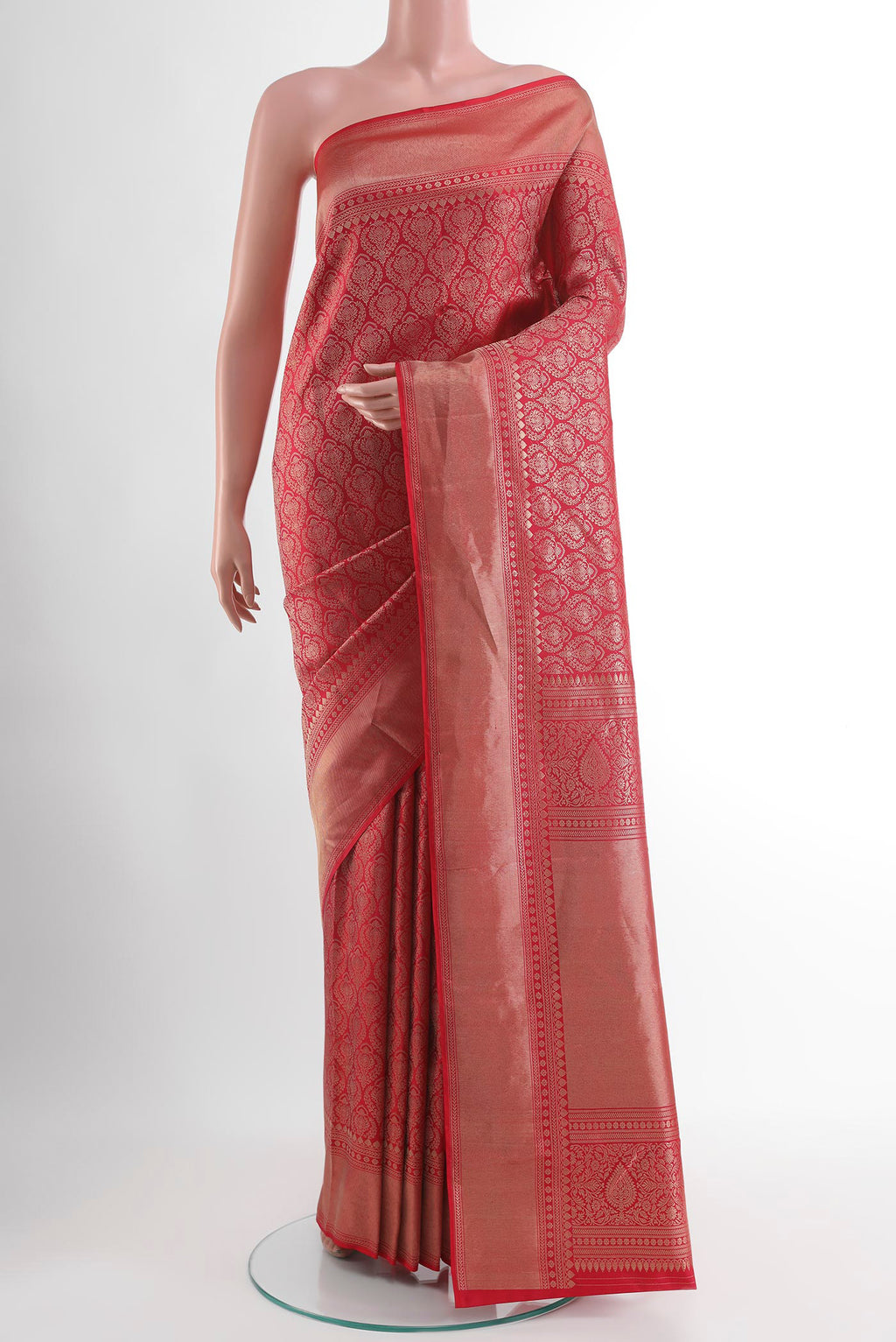 Red Kanchipuram Silk Saree with Zari Butta on the body and Zari Border.  displayed on a mannequin