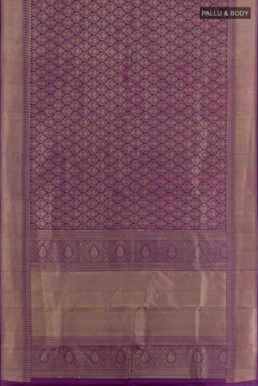 Flat view of Purple Kanchipuram Silk Saree with Zari Butta on the body and Zari Border. 