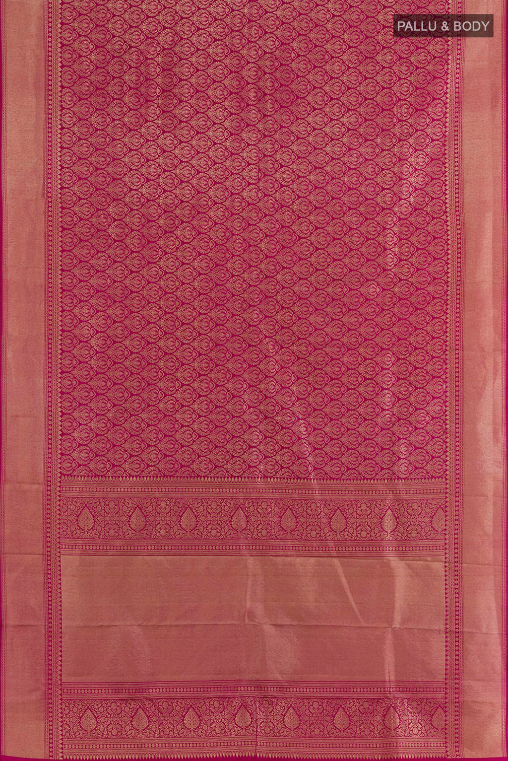 Flat view of Rani Pink Kanchipuram Silk Saree with Zari Butta on the body and Zari Border. 