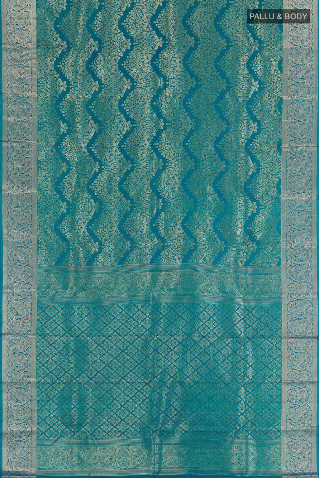 Flat view of Blue Kanjivaram Silk Saree with Zari Brocade on the body and Zari Border. 