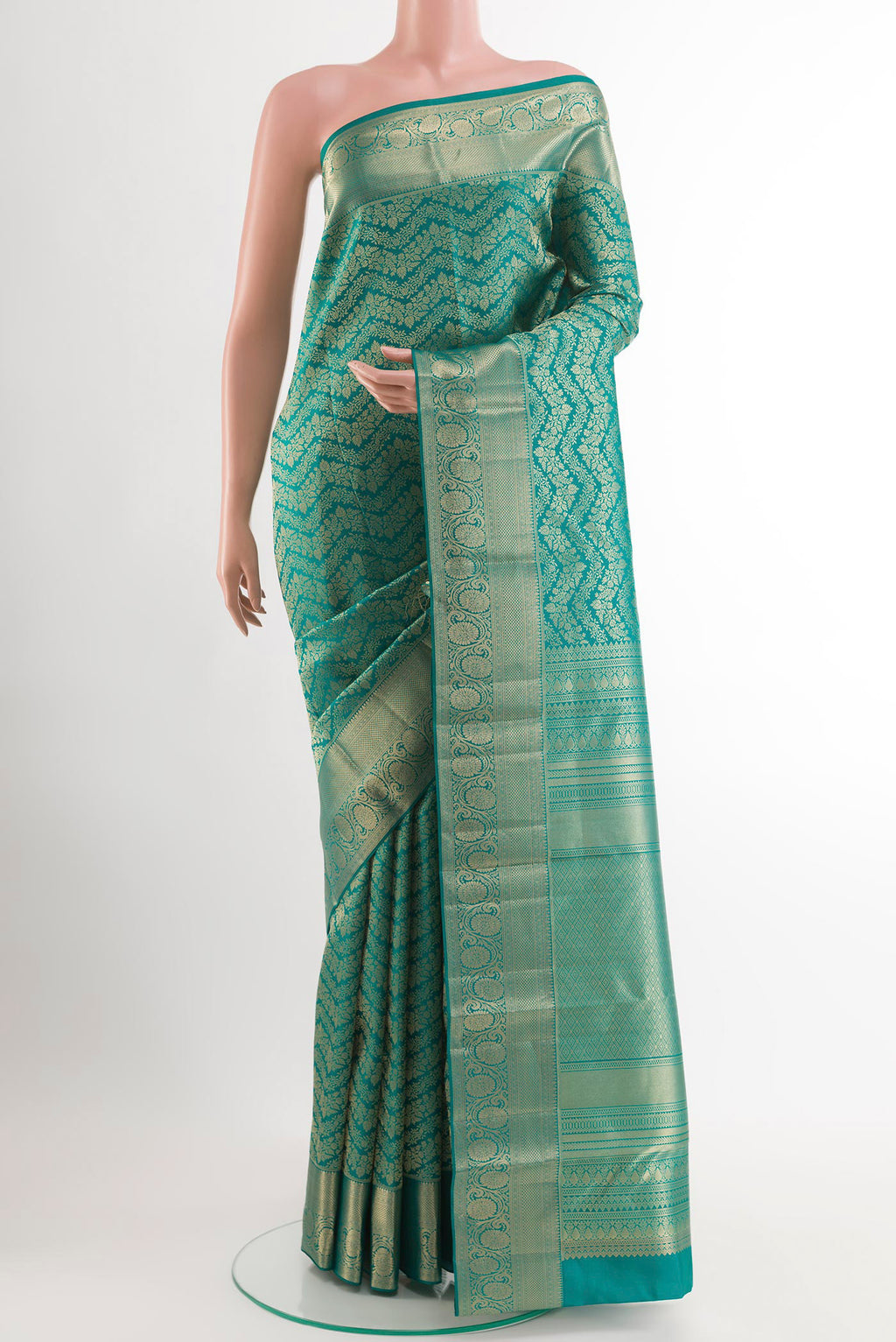 Sea Green Kanchipuram Silk Saree with Zari Brocade on the body and Zari Border.  displayed on a mannequin