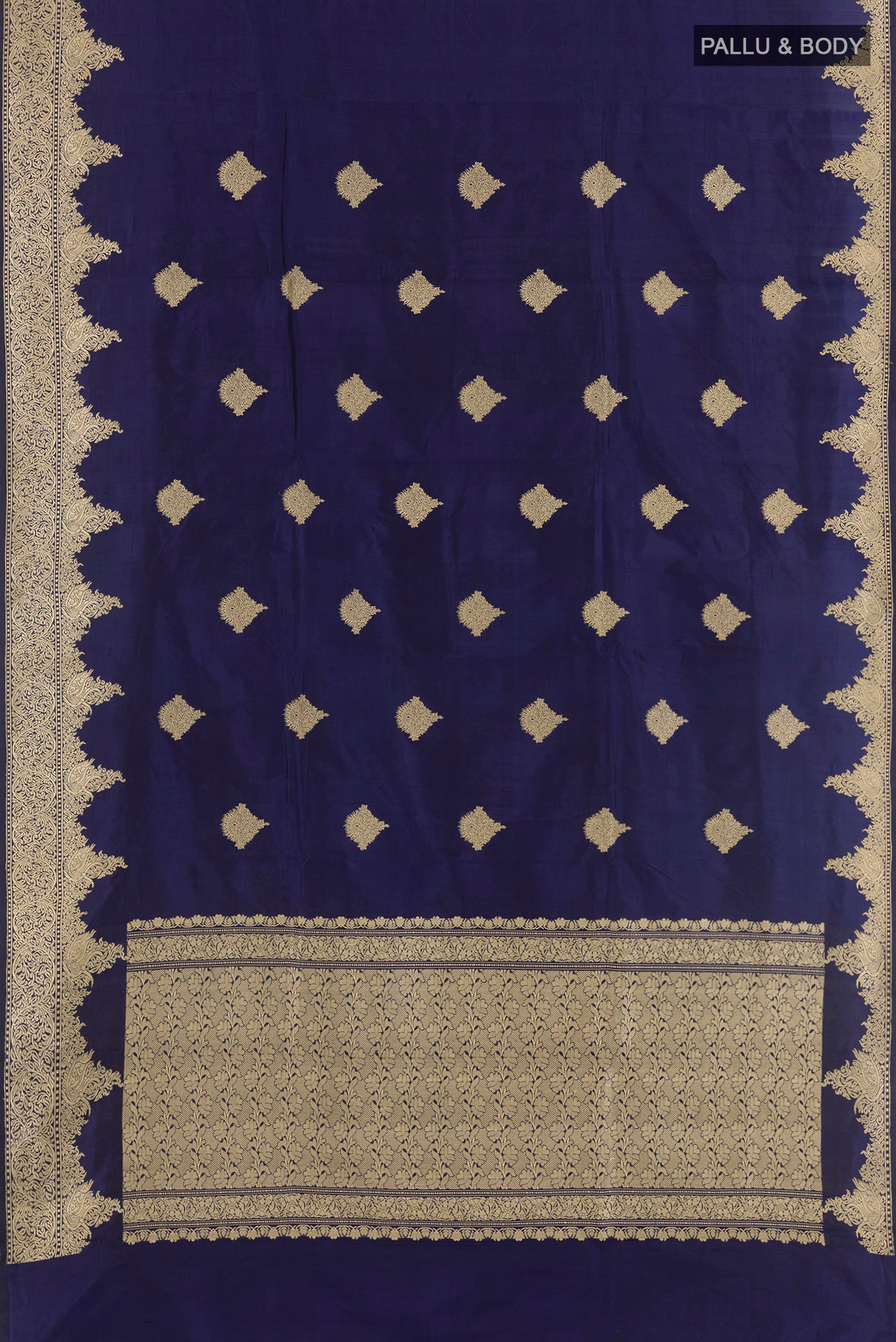 Flat view of Blue Banarasi Katan Silk Saree with Zari Butta on the body and Zari Border. 