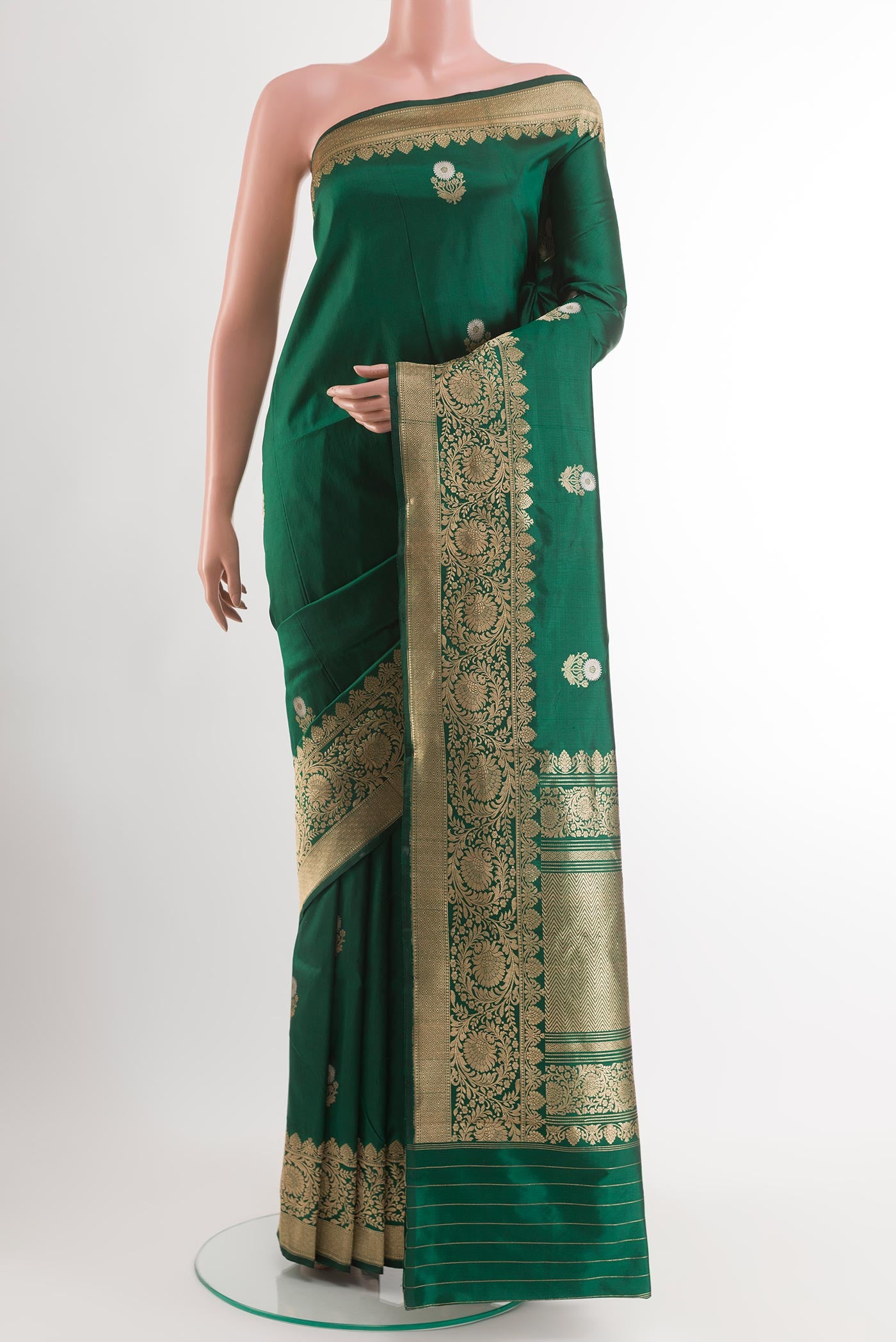 Green Banarasi Katan Silk Saree with Zari Butta on the body and Zari Border.  displayed on a mannequin
