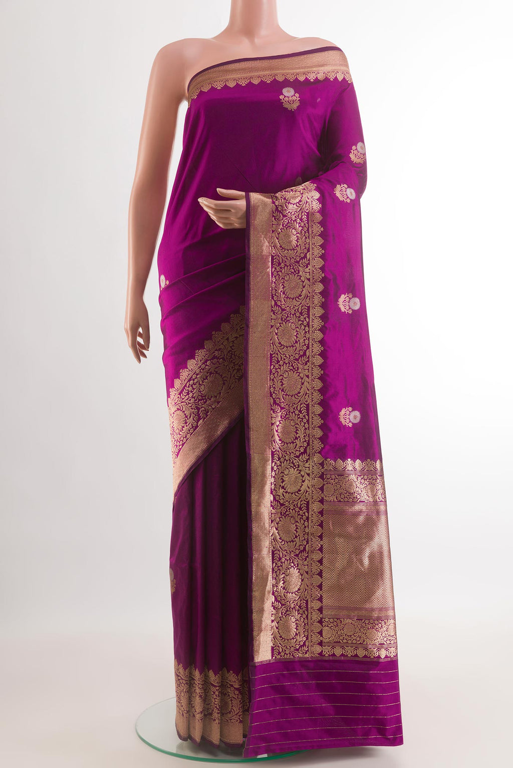 Purple Banarasi Katan Silk Saree with Zari Butta on the body and Zari Border.  displayed on a mannequin