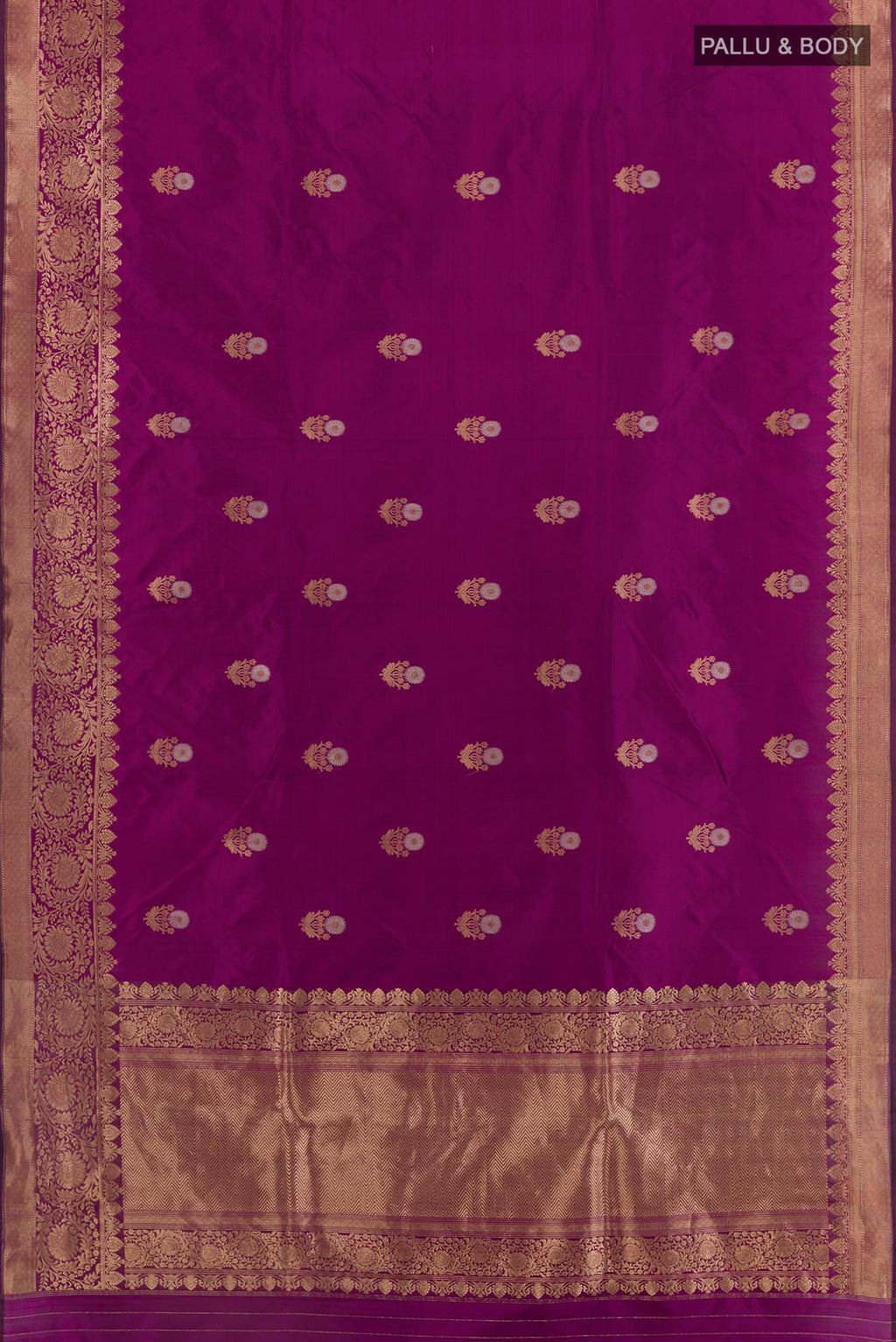 Flat view of Purple Banarasi Katan Silk Saree with Zari Butta on the body and Zari Border. 