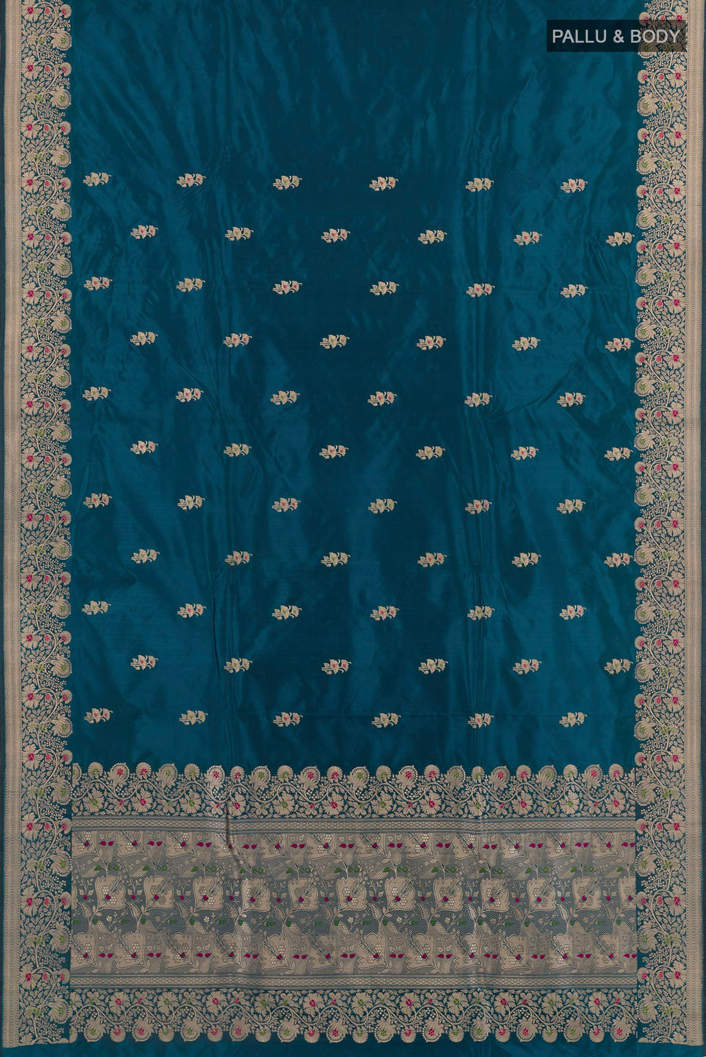 Flat view of Blue Banarasi Katan Silk Saree with Zari Butta on the body and Zari Border. 
