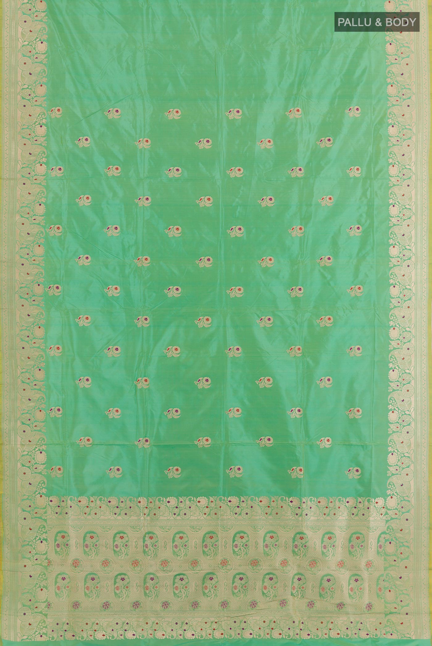 Flat view of Light Green Dual Tone Banarasi Katan Silk Saree with Zari Butta on the body and Zari Border. 