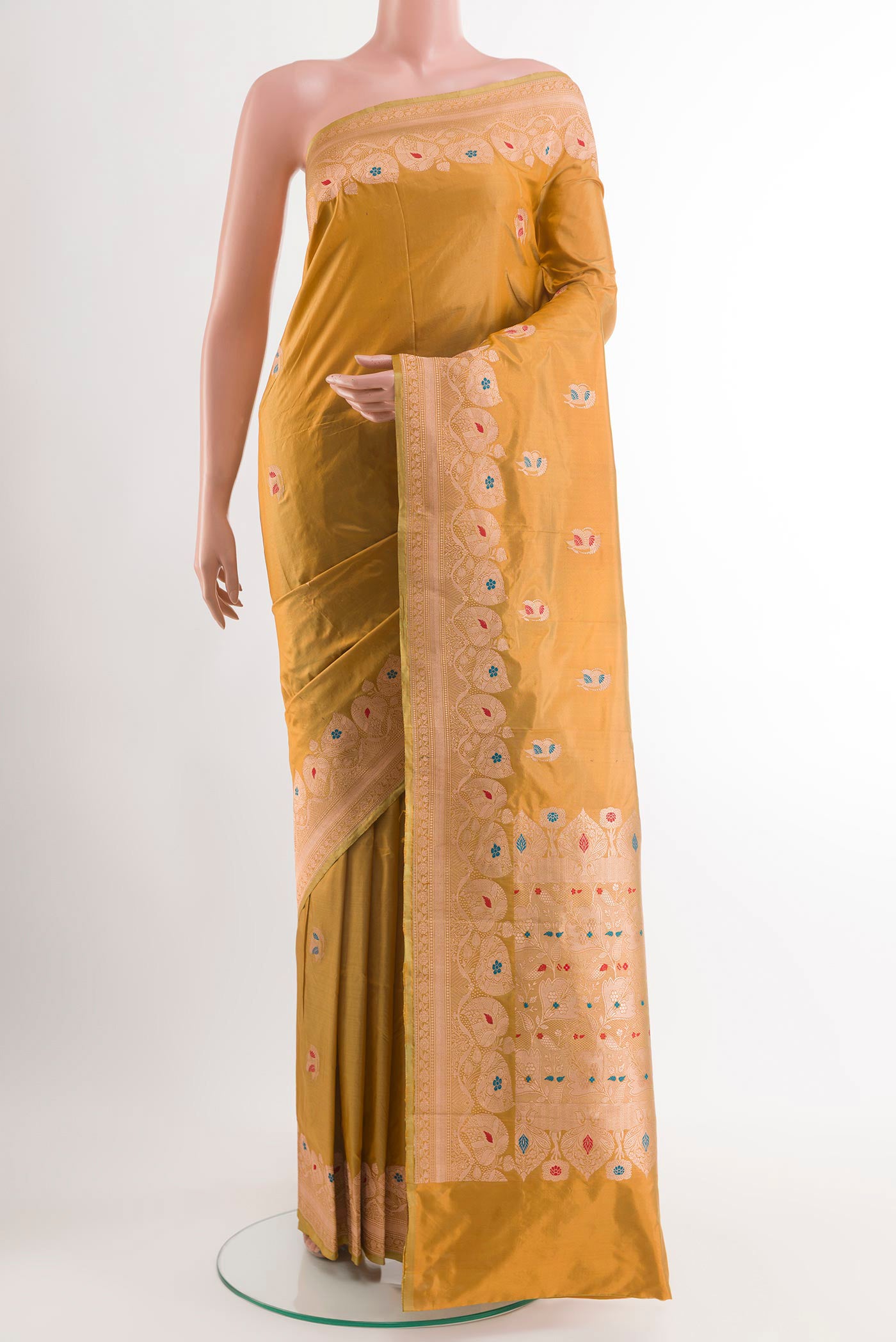 Mustard Banarasi Katan Silk Saree with Zari Butta on the body and Zari Border.  displayed on a mannequin