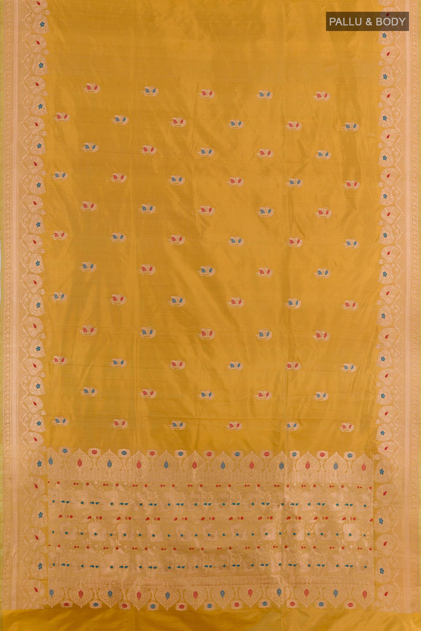 Flat view of Mustard Banarasi Katan Silk Saree with Zari Butta on the body and Zari Border. 