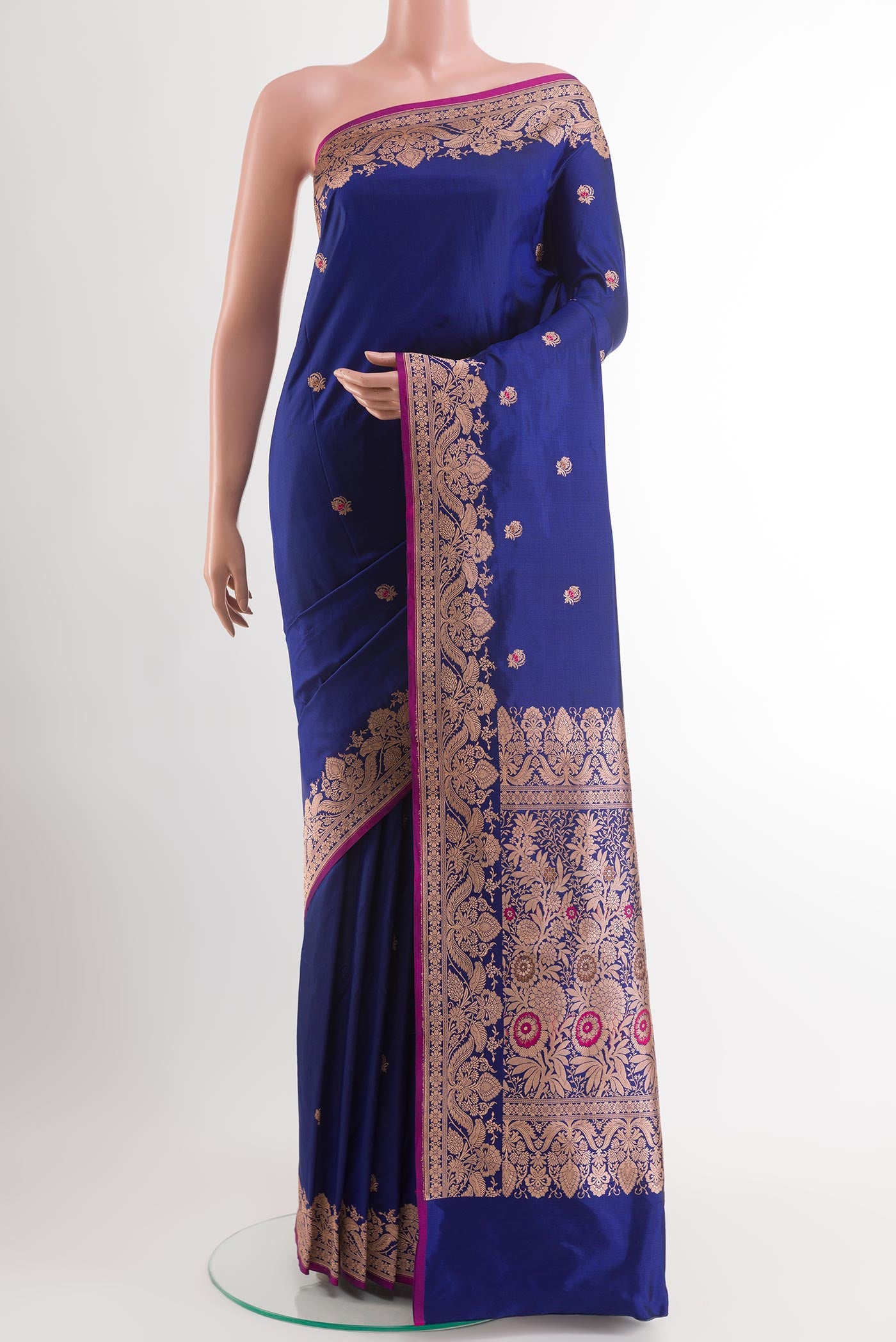Royal Blue Banarasi Katan Silk Saree with Zari Butta on the body and Zari Border.  displayed on a mannequin