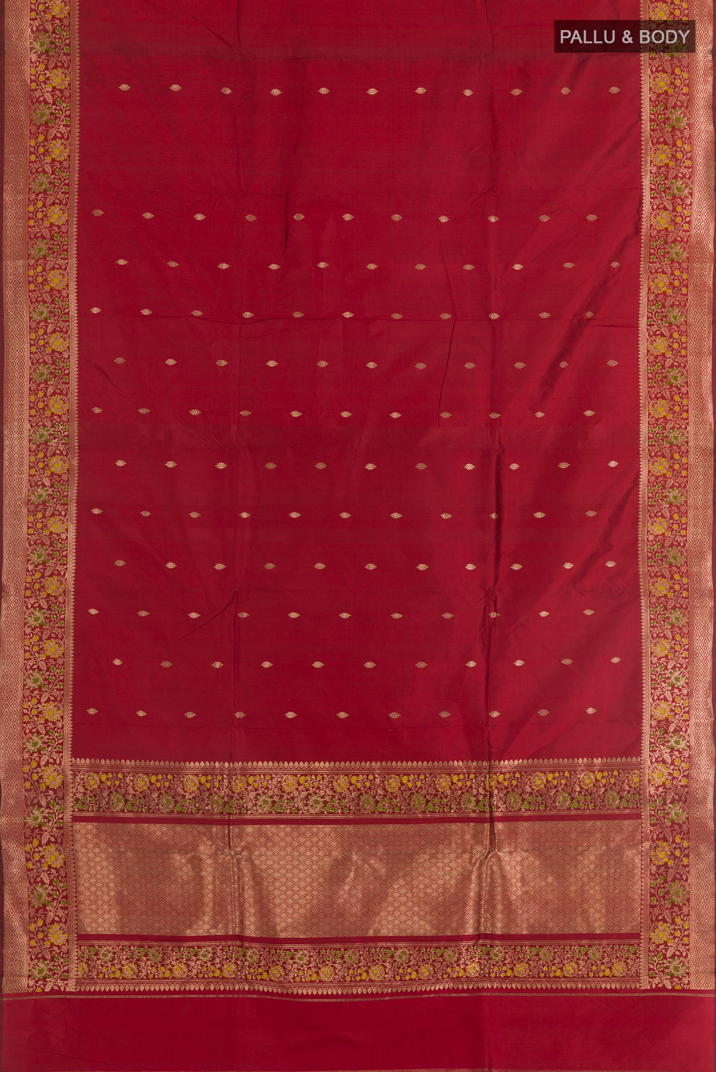 Flat view of Red Banarasi Katan Silk Saree with Zari Butta on the body and Zari Border. 