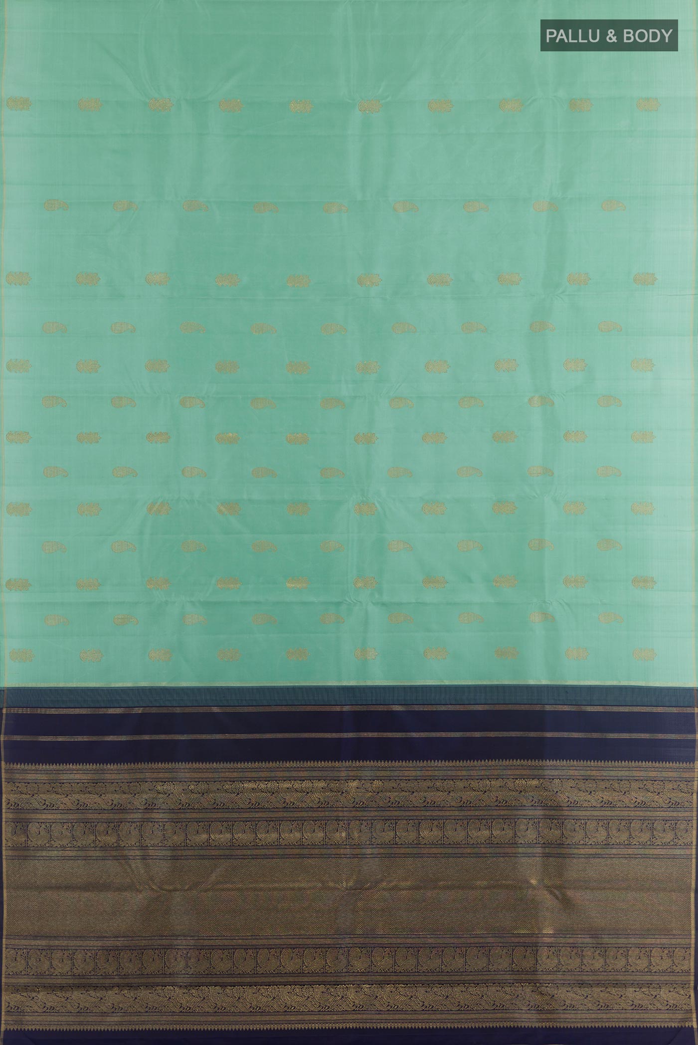 Flat view of Pure Silk Pure Zari Light Blue Kanchipuram Saree with Zari Butta on the body and Zari Border. 
