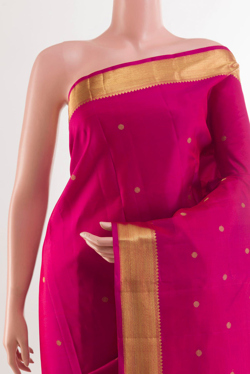 Border image of Rani Pink Dual Tone Kanjivaram Silk Saree with Zari Butta on the body and Zari Border. 