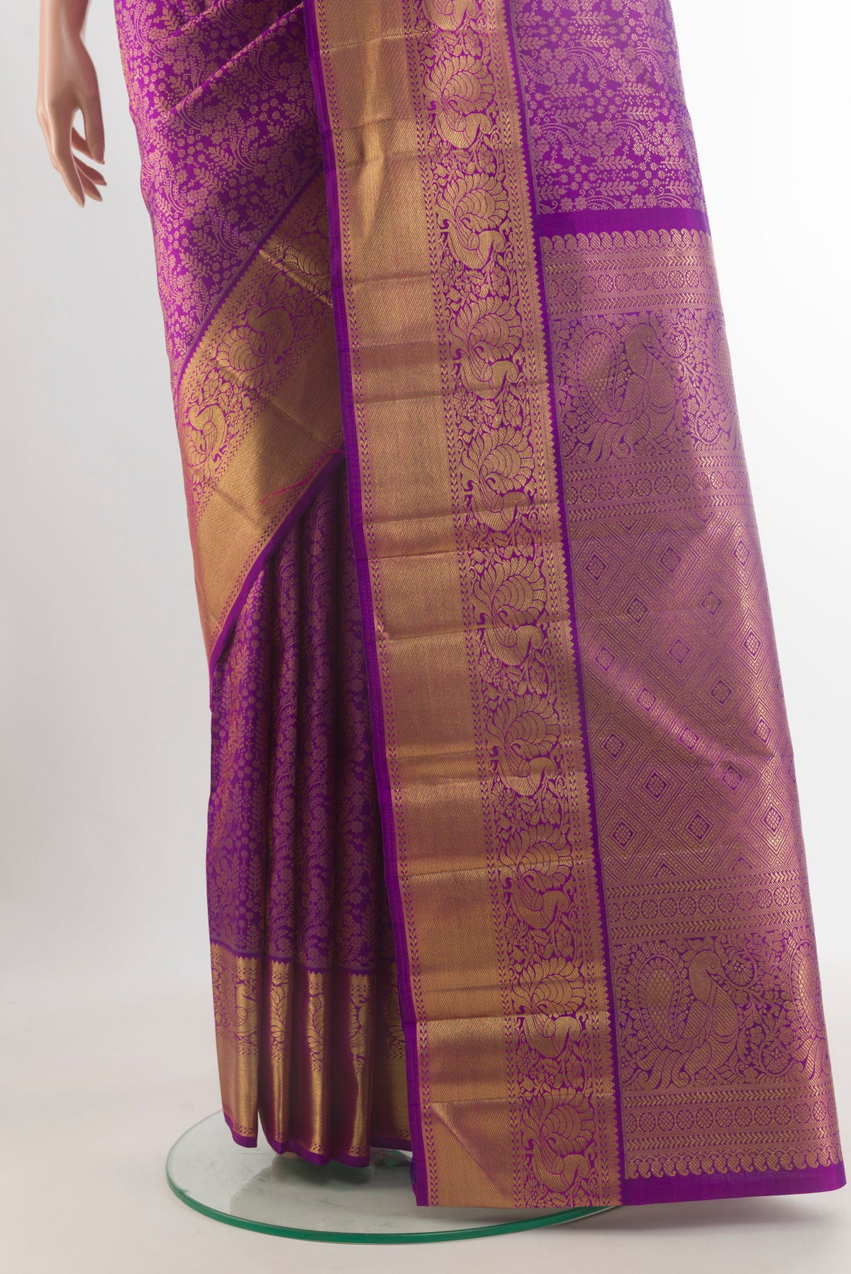 Pleats and pallu of Pure Silk Pure Zari Purple Kanjivaram Saree with Zari Brocade on the body and Zari Border. 