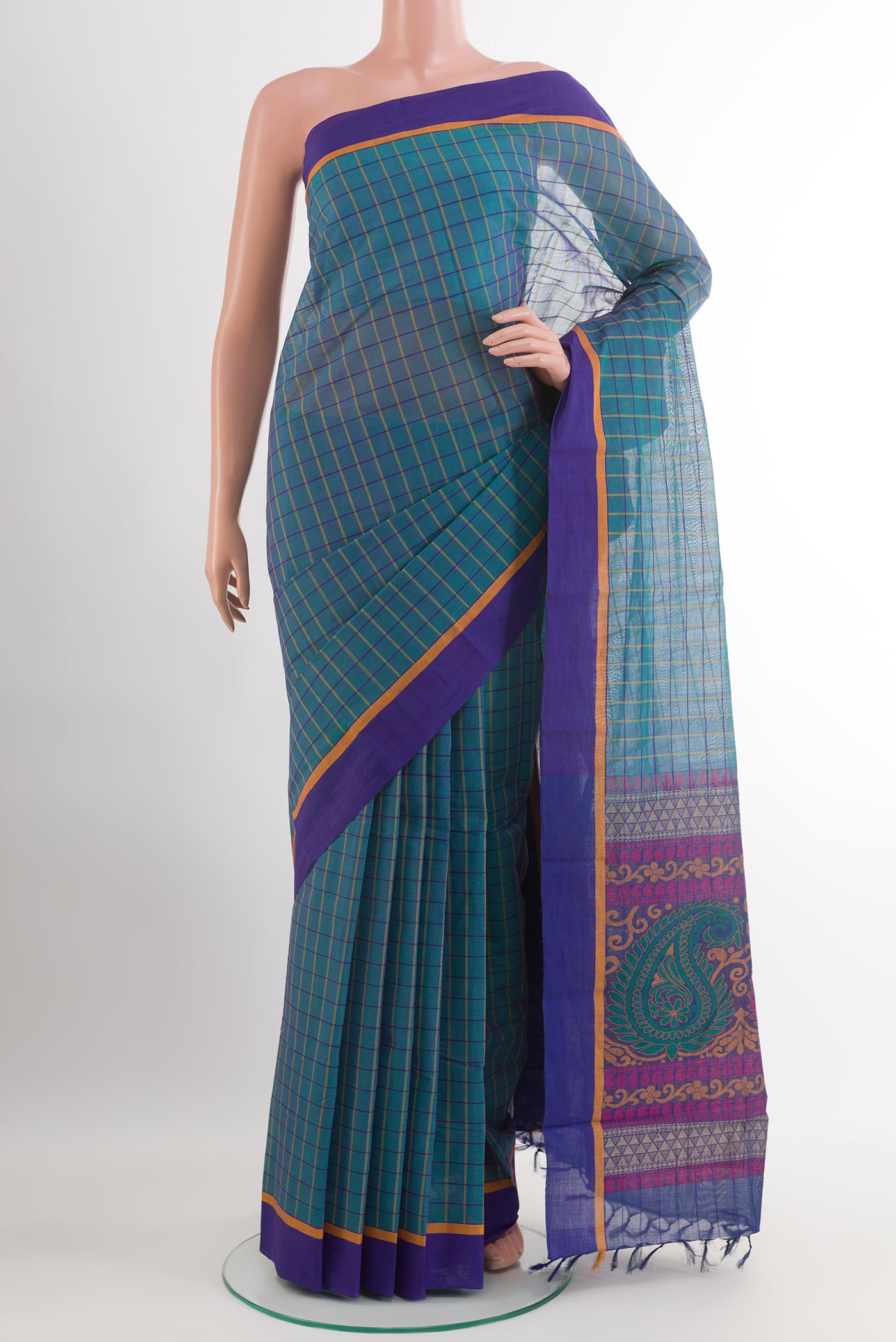 Blue Kanchi Cotton Saree with Checked design on the body and Plain Border.  displayed on a mannequin