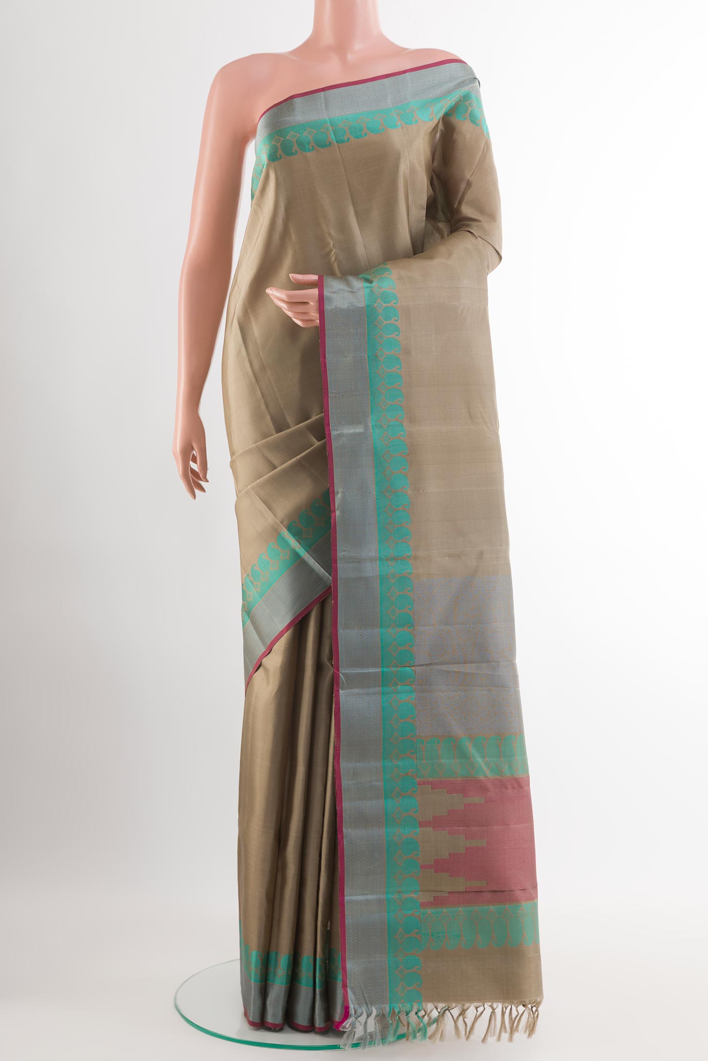 Grey Kanchipuram Silk Saree with Plain Body and Thread Embroidery Border.  displayed on a mannequin