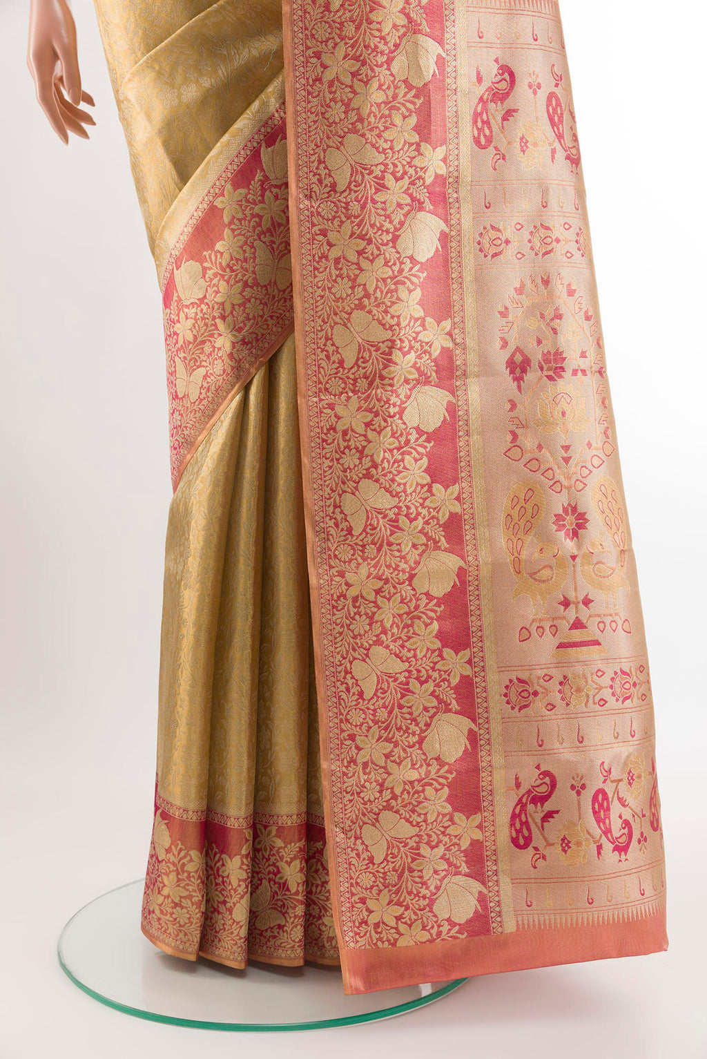 Pleats and pallu of Golden Kanjivaram Silk Saree with Zari Brocade on the body and Zari Border. 
