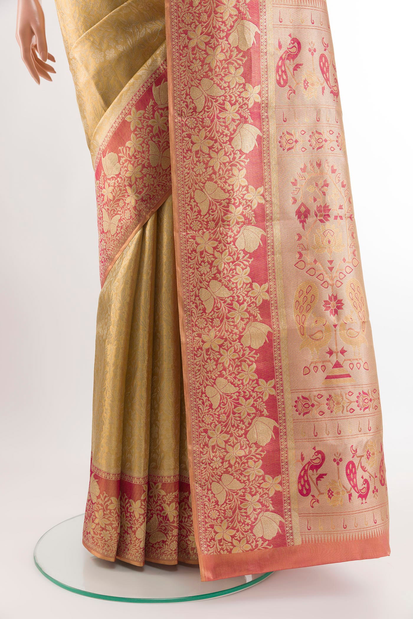 Pleats and pallu of Golden Kanjivaram Silk Saree with Zari Brocade on the body and Zari Border. 