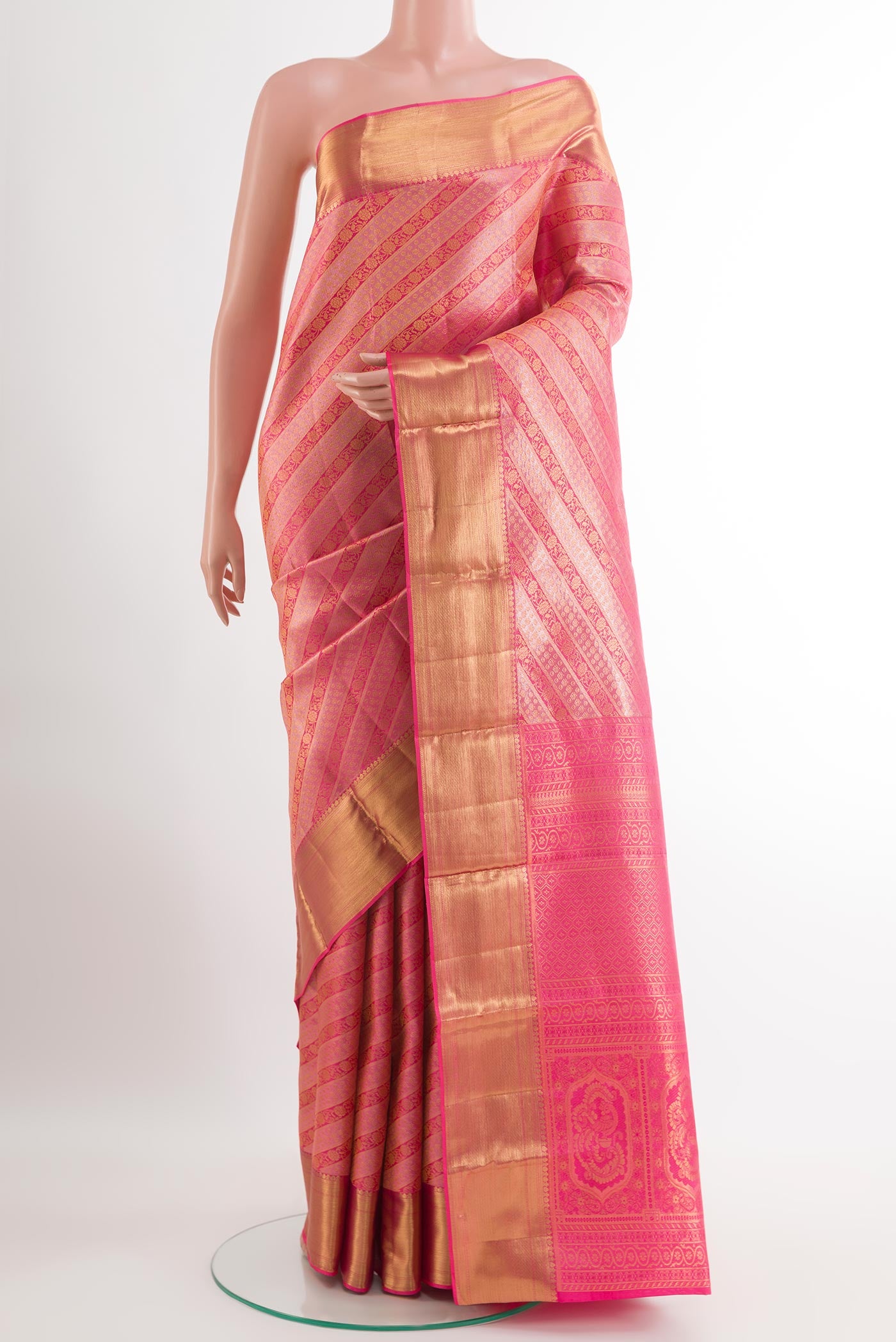 Pink Kanjivaram Silk Saree with Zari Brocade on the body and Zari Border.  displayed on a mannequin