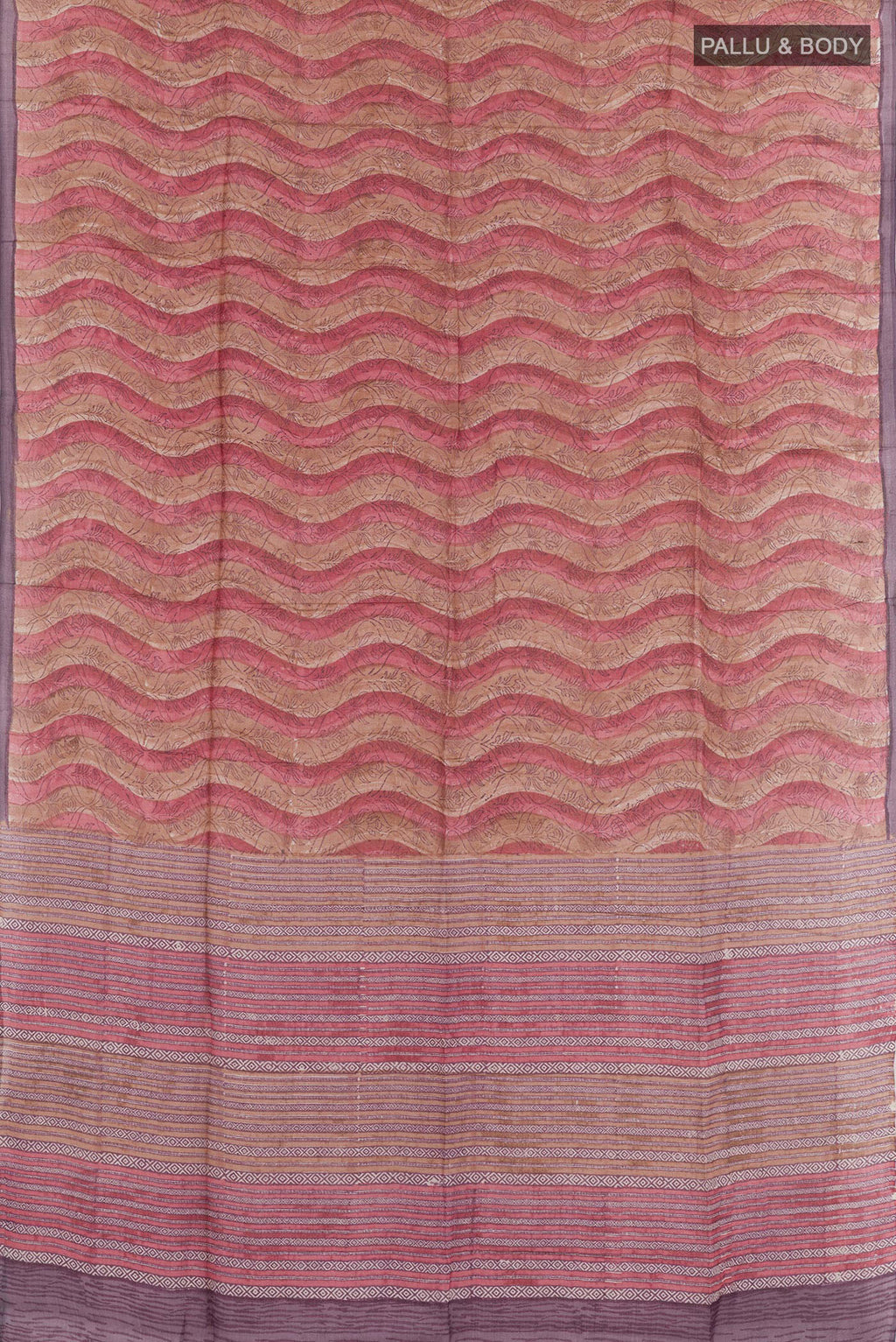 Flat view of Purple Tussar Saree with Printed design on the body and Zari Border. 