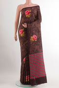 Brown Printed Silk Saree with Printed design on the body and Plain Border.  displayed on a mannequin