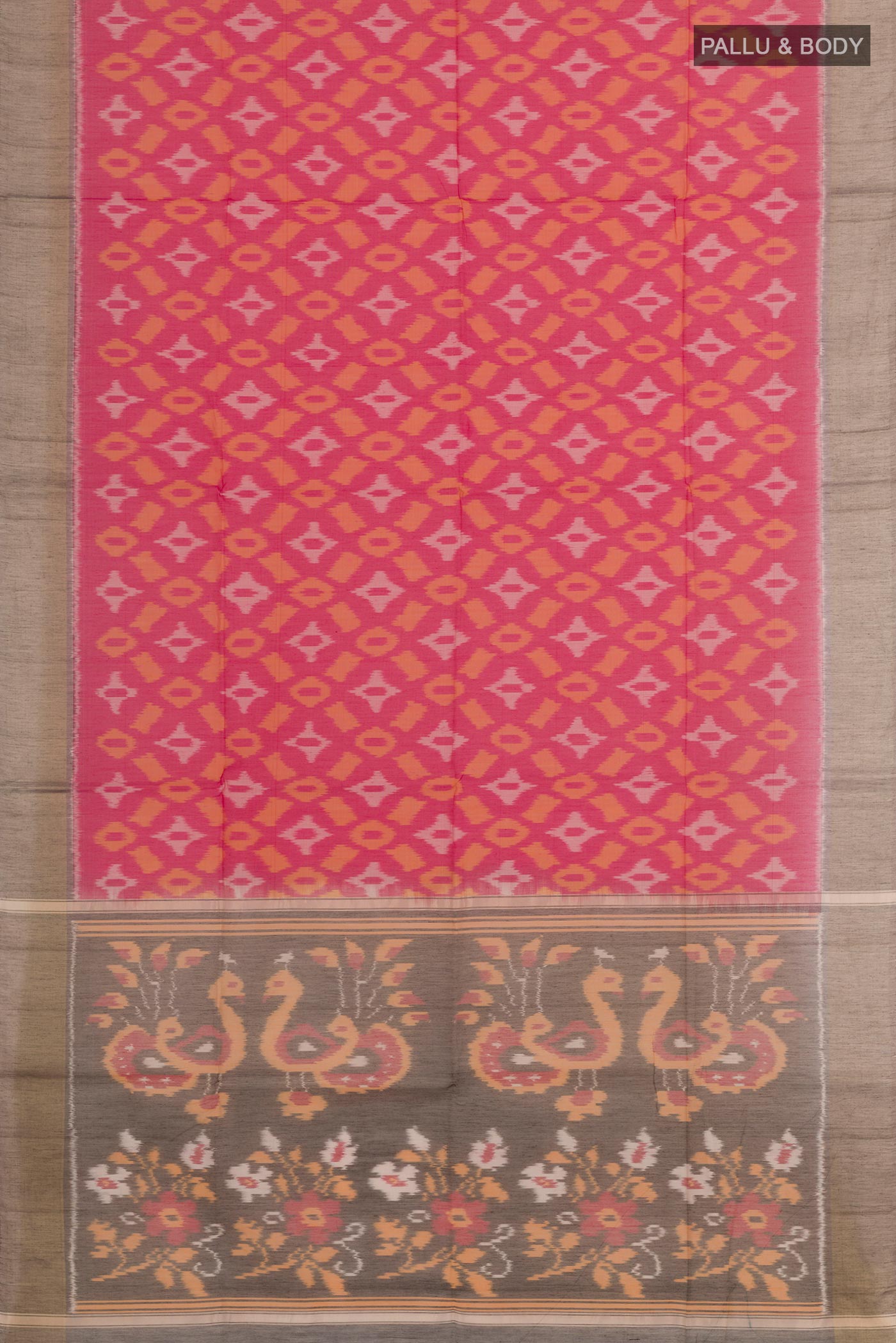 Flat view of Pink Blended Kora Cotton Saree with Ikat design on the body and Zari Border. 