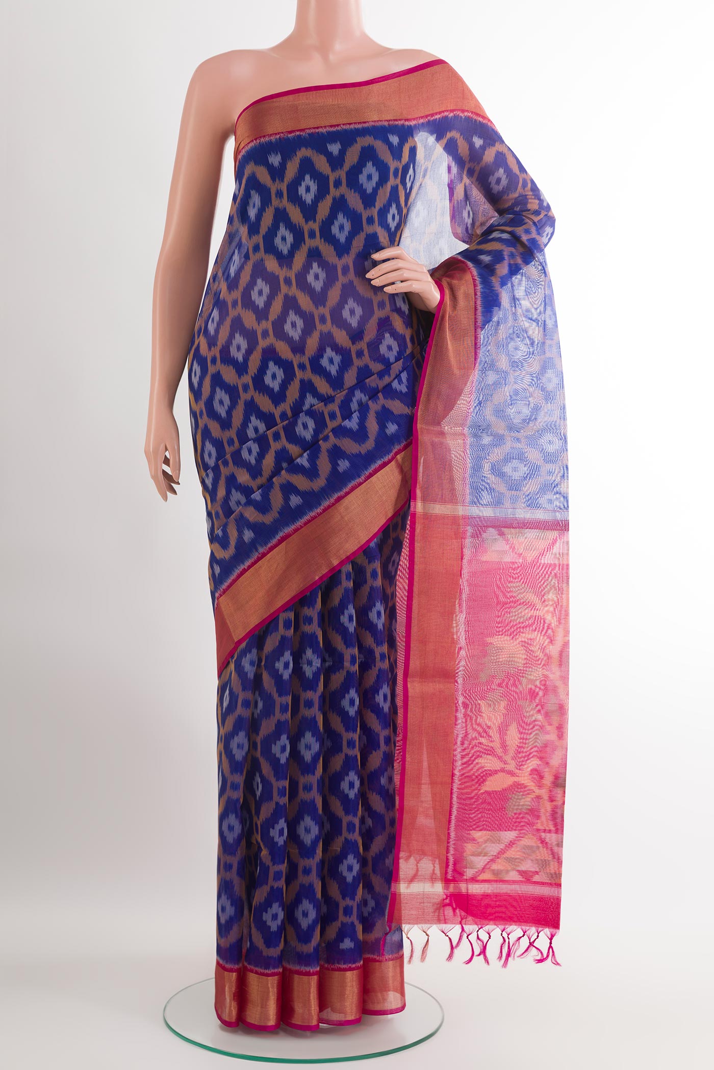 Blue Blended Kora Cotton Saree with Ikat design on the body and Zari Border.  displayed on a mannequin