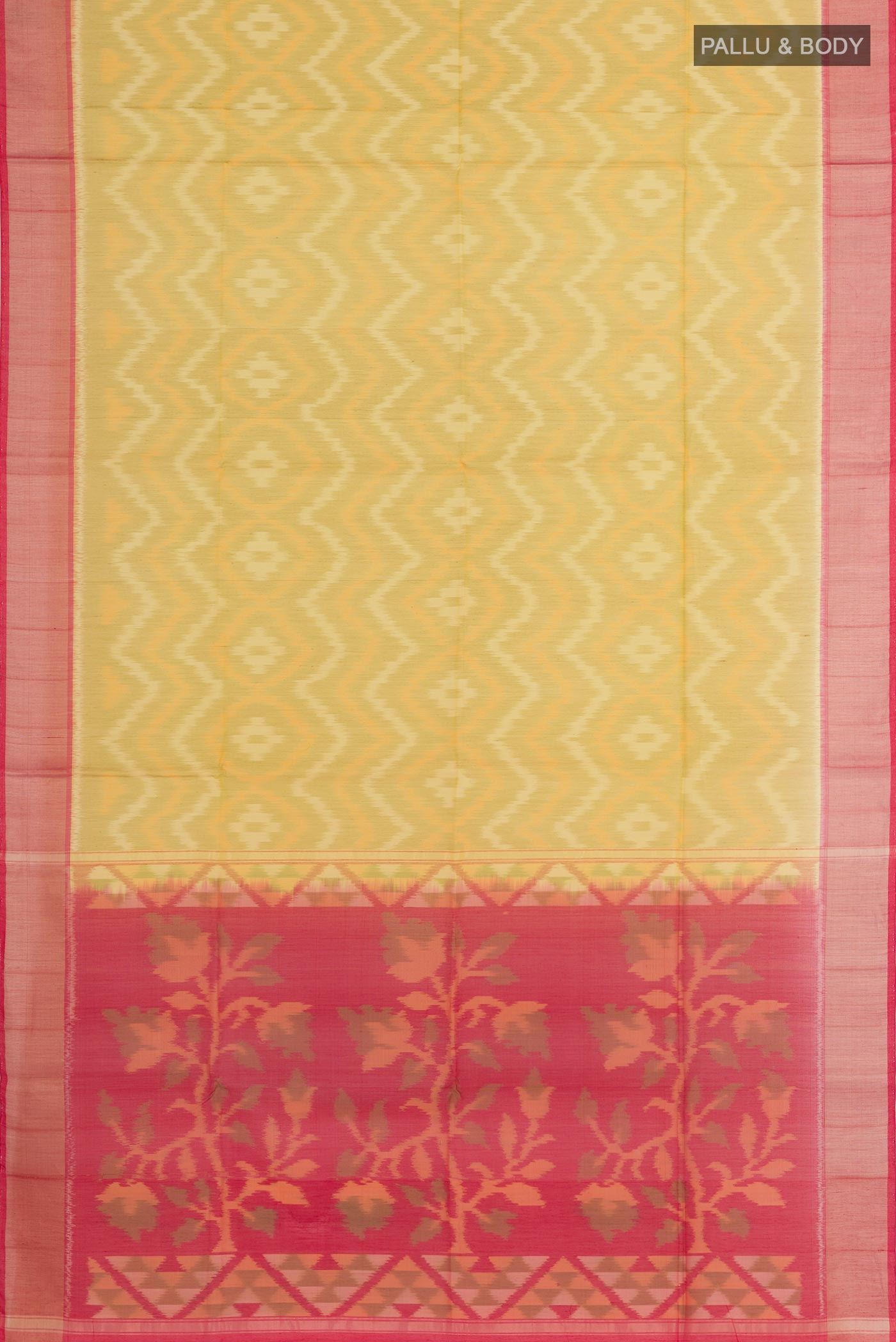 Flat view of Yellow Blended Kora Cotton Saree with Ikat design on the body and Zari Border. 