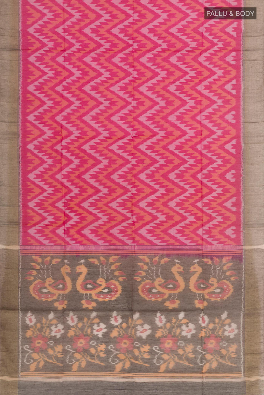 Flat view of Pink Blended Kora Cotton Saree with Ikat design on the body and Zari Border. 