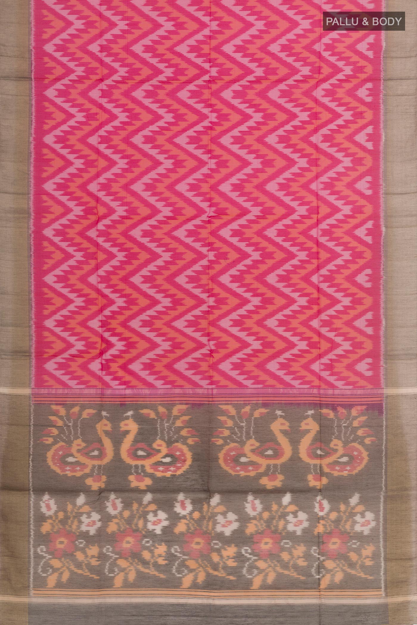 Flat view of Pink Blended Kora Cotton Saree with Ikat design on the body and Zari Border. 