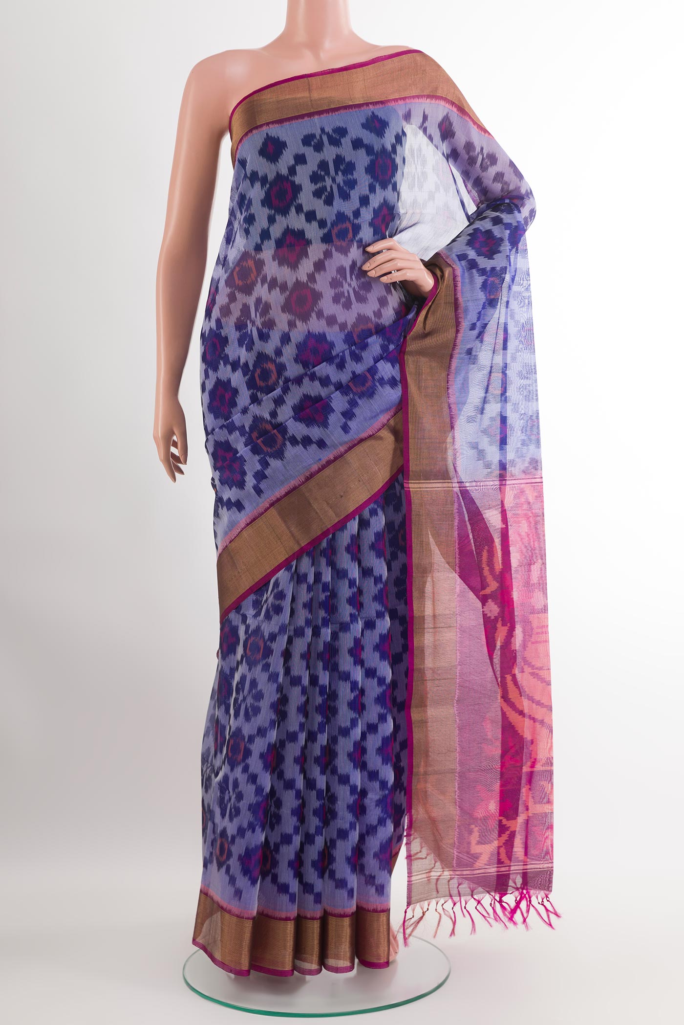 Blue Blended Kora Cotton Saree with Ikat design on the body and Zari Border.  displayed on a mannequin