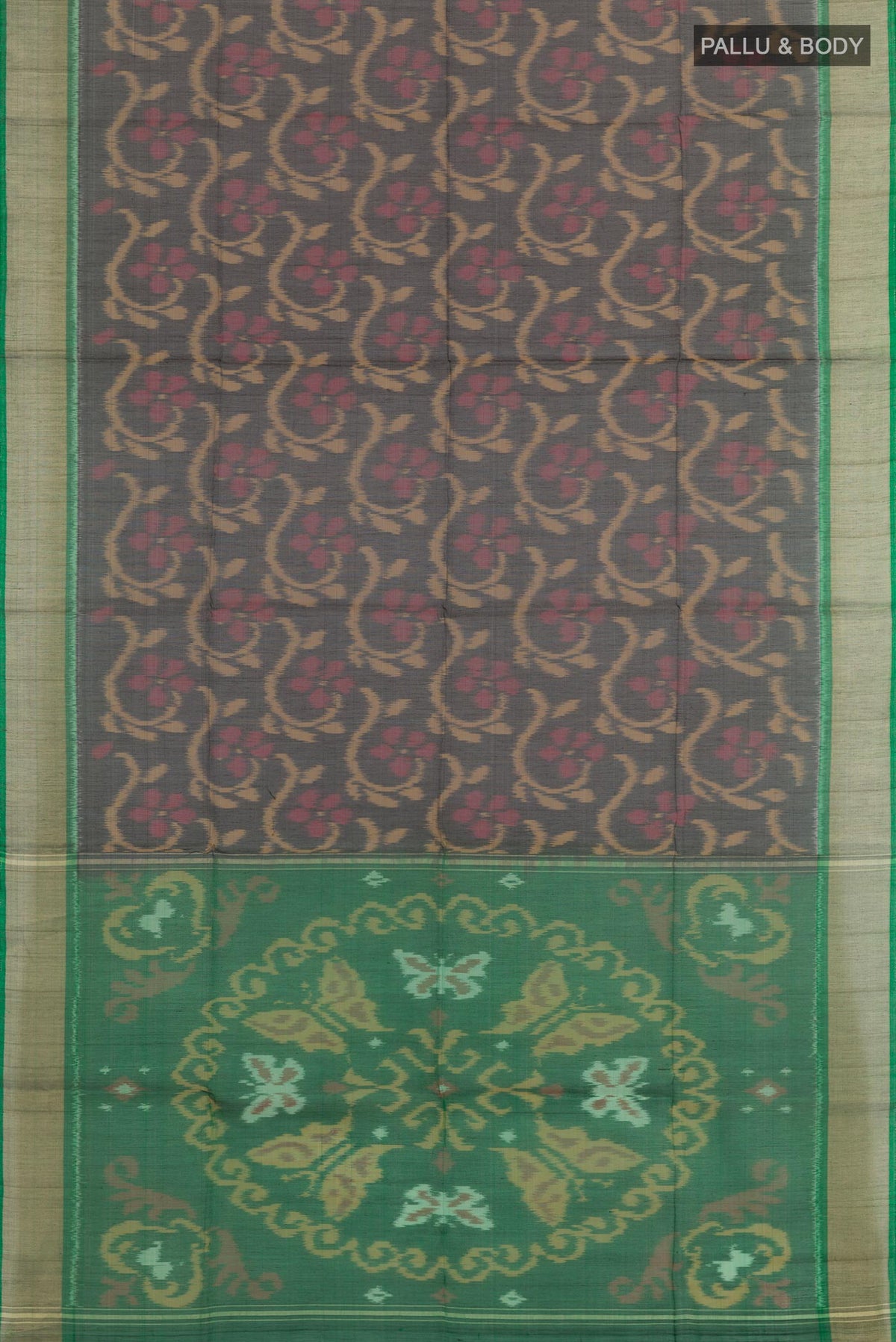 Flat view of Black Blended Kora Cotton Saree with Ikat design on the body and Zari Border. 