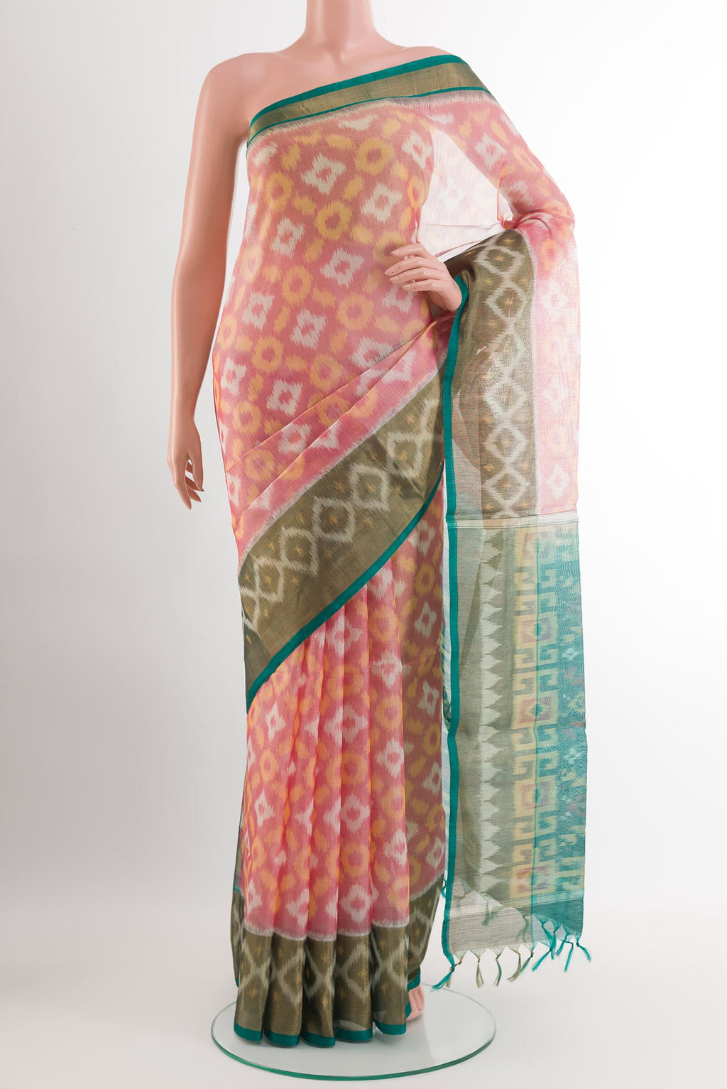 Red Blended Kora Cotton Saree with Ikat design on the body and Zari Border.  displayed on a mannequin