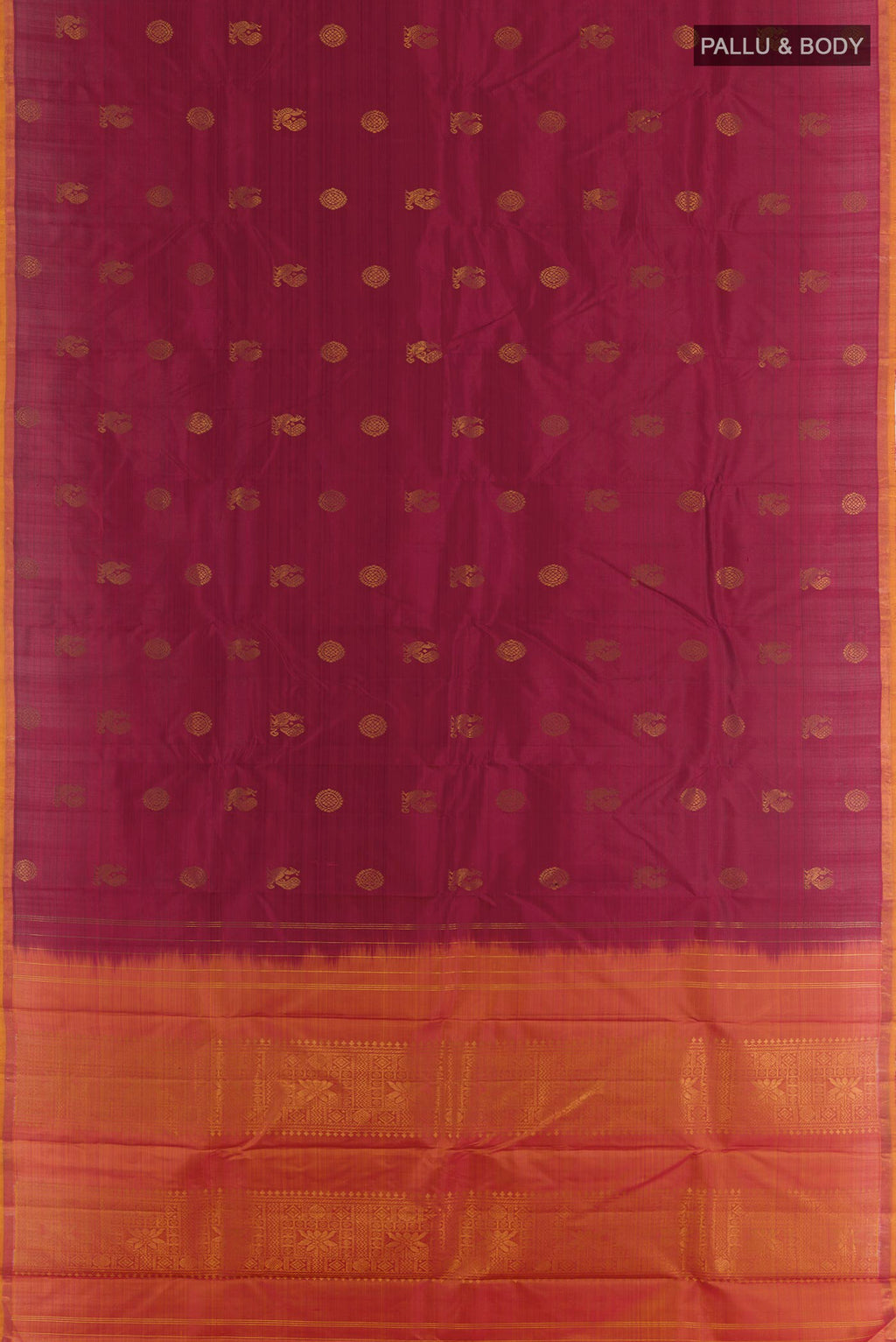 Flat view of Maroon Kanchipuram Silk Saree with Zari Butta on the body and Zari Border. 
