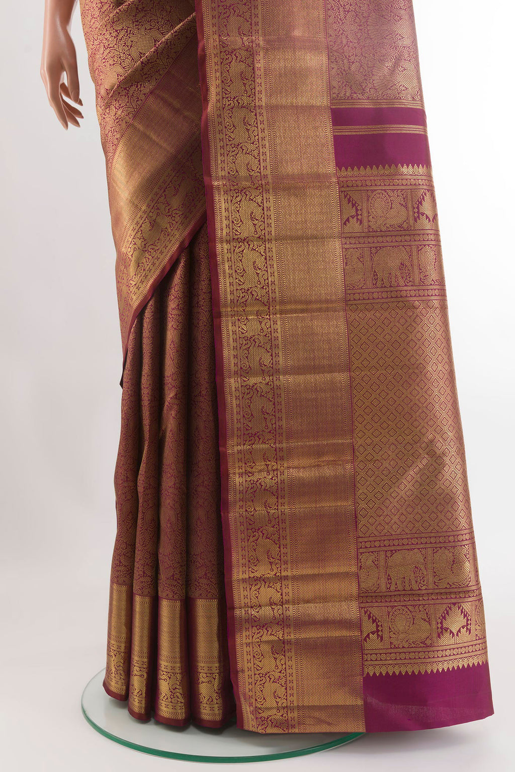 Pleats and pallu of Pure Silk Pure Zari Maroon Kanjivaram Saree with Zari Brocade on the body and Zari Border. 