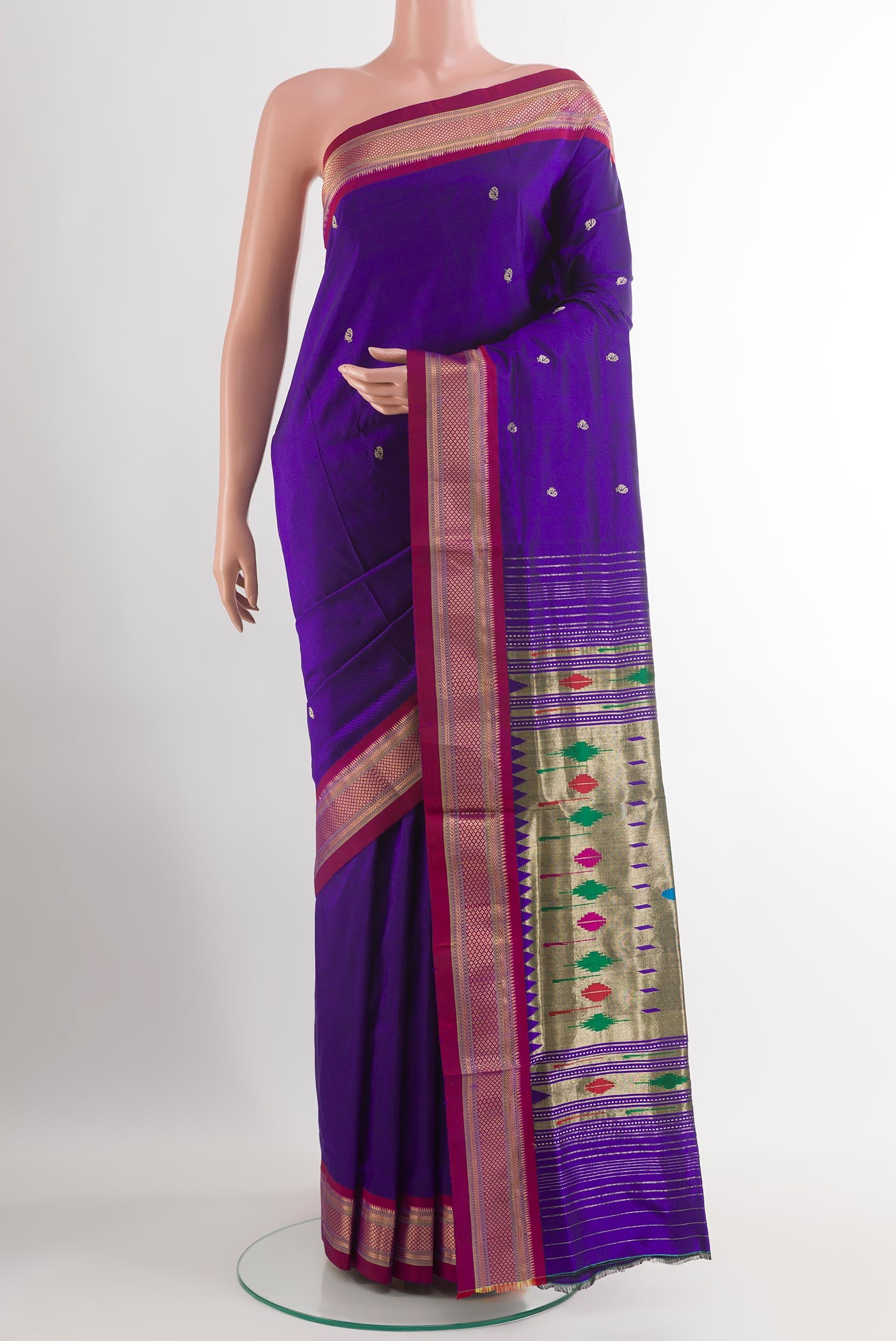 Dark Blue Paithani Silk Saree with Zari Butta on the body and Zari Border.  displayed on a mannequin