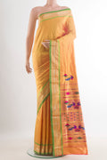 Pure Silk Yellow Paithani Saree with Zari Butta on the body and Zari Border.  displayed on a mannequin