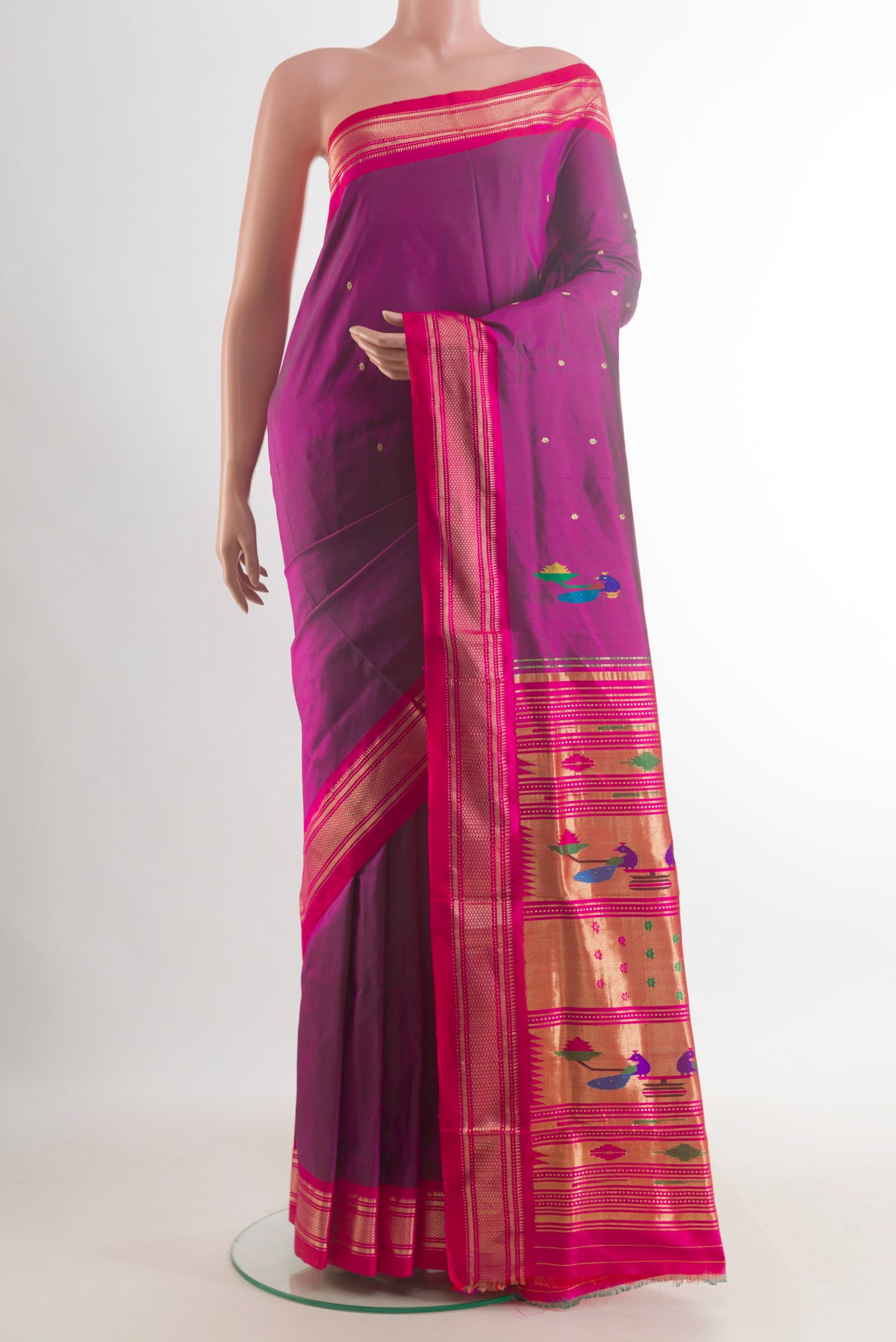 Pure Silk Purple Paithani Saree with Zari Butta on the body and Zari Border.  displayed on a mannequin